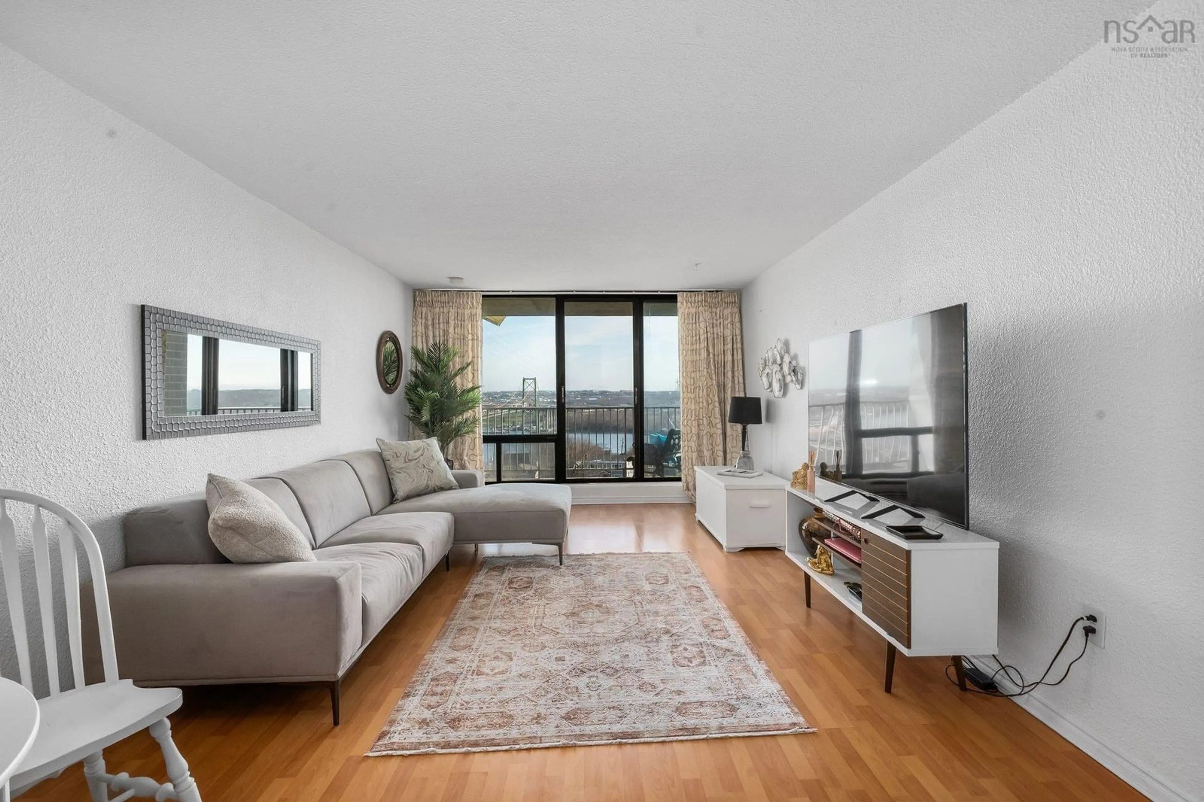 Living room with furniture, unknown for 5572 North Ridge Rd #1002, Halifax Nova Scotia B3K 5K2