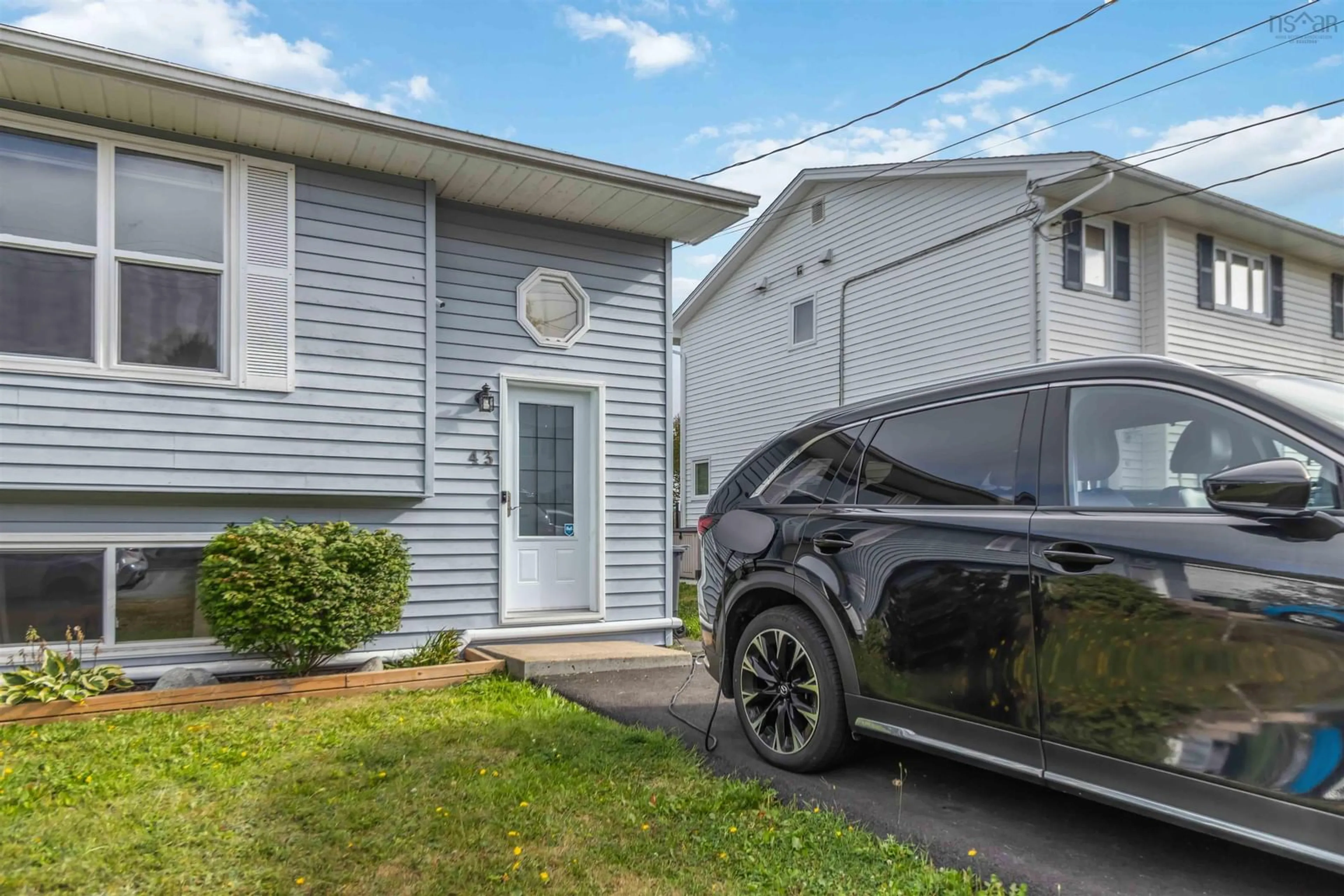 Home with vinyl exterior material, street for 43 Cider Maple Dr, Timberlea Nova Scotia B3T 1K8