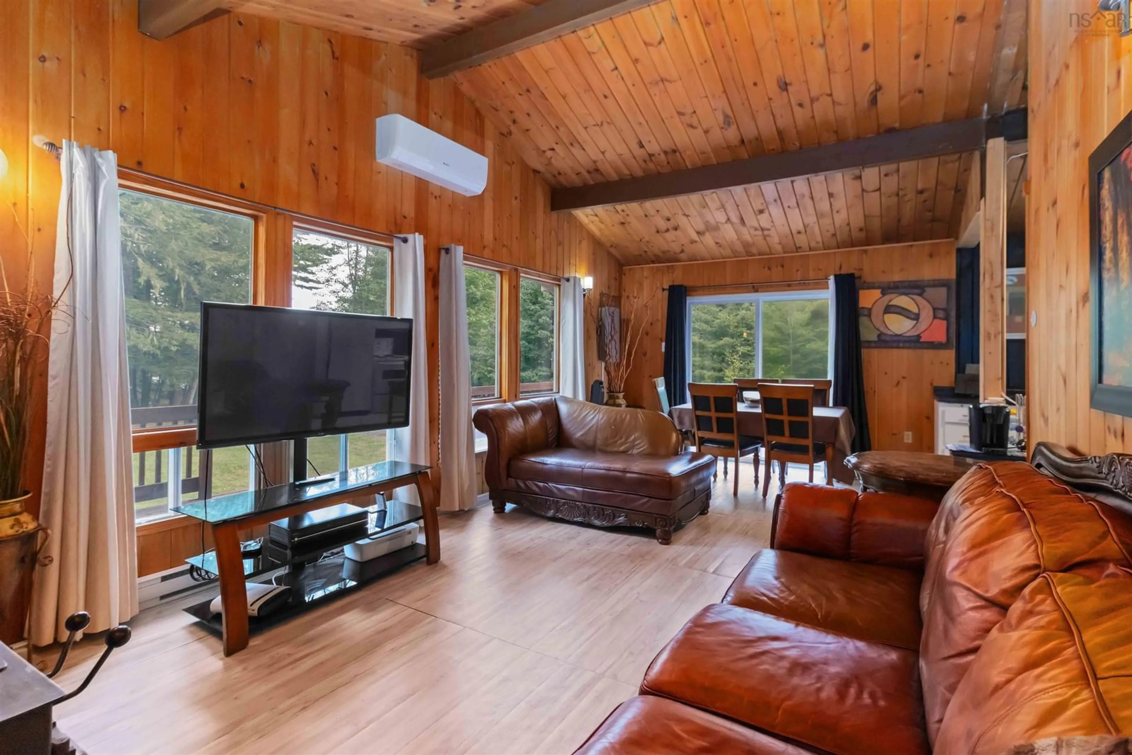 Living room with furniture, wood/laminate floor for 161 Annis Beach Road, Labelle Nova Scotia B0T 1E0