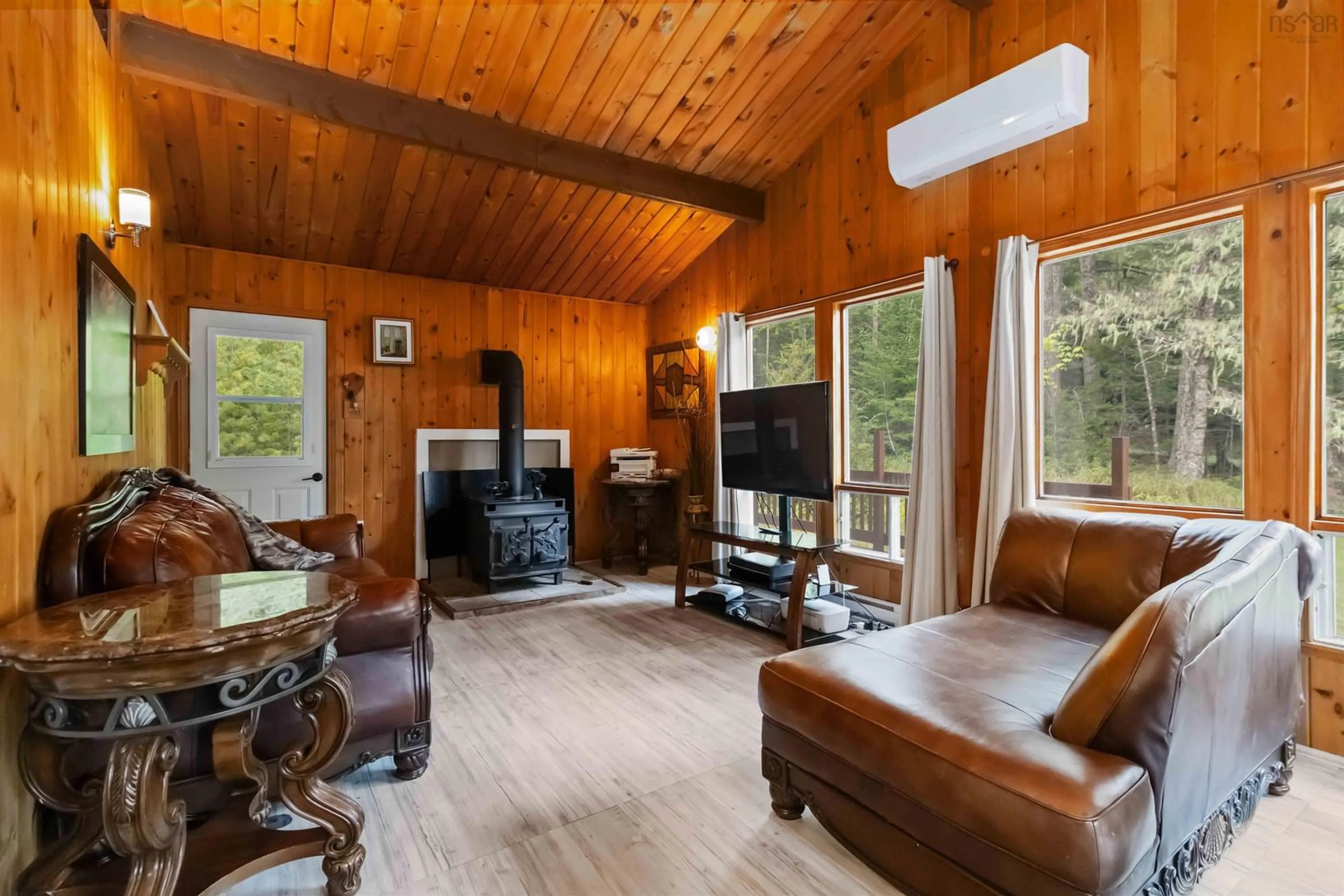 Living room with furniture, wood/laminate floor for 161 Annis Beach Road, Labelle Nova Scotia B0T 1E0