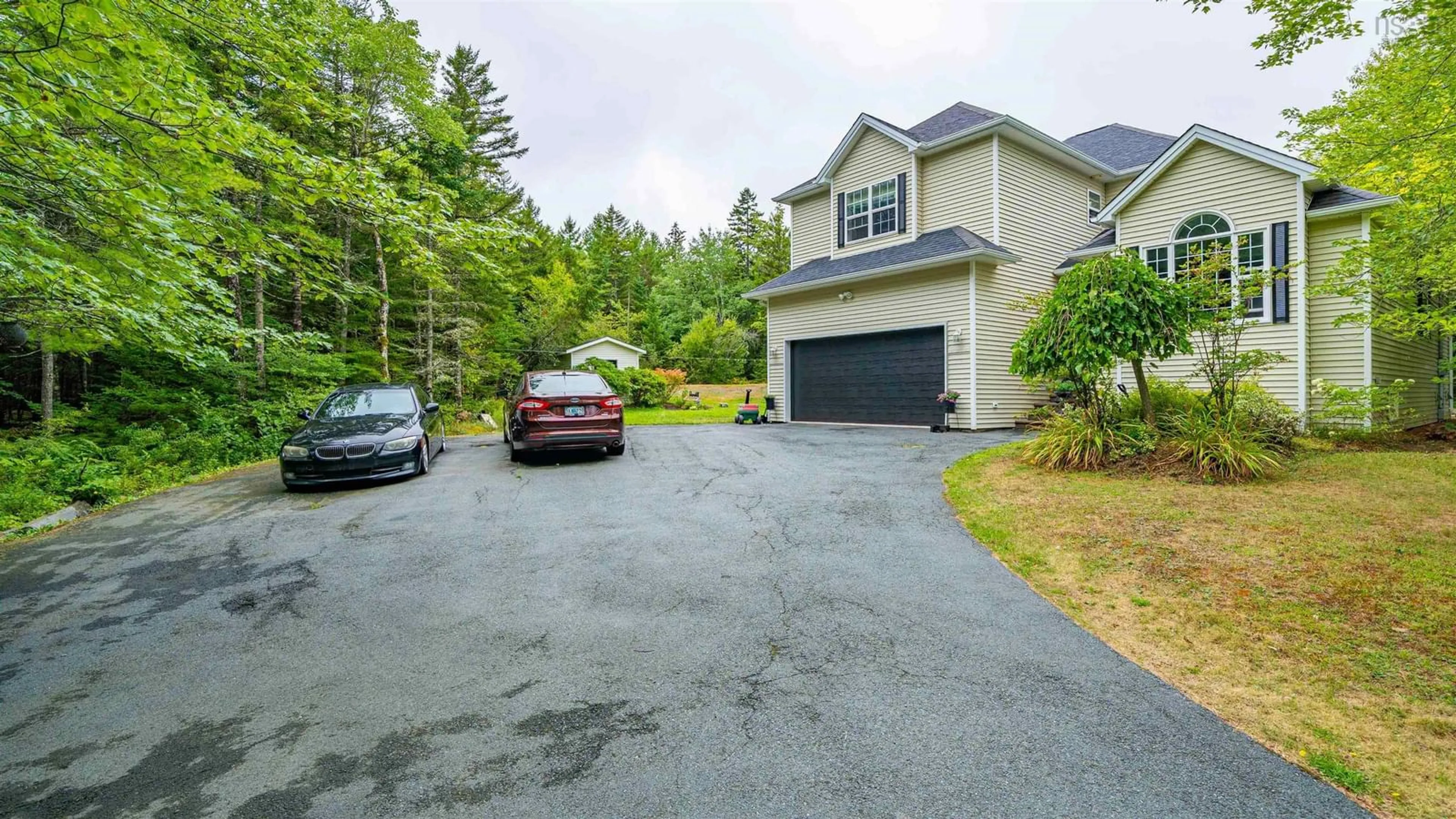 A pic from outside/outdoor area/front of a property/back of a property/a pic from drone, street for 60 Blue Forest Lane, Hammonds Plains Nova Scotia B4B 1L1