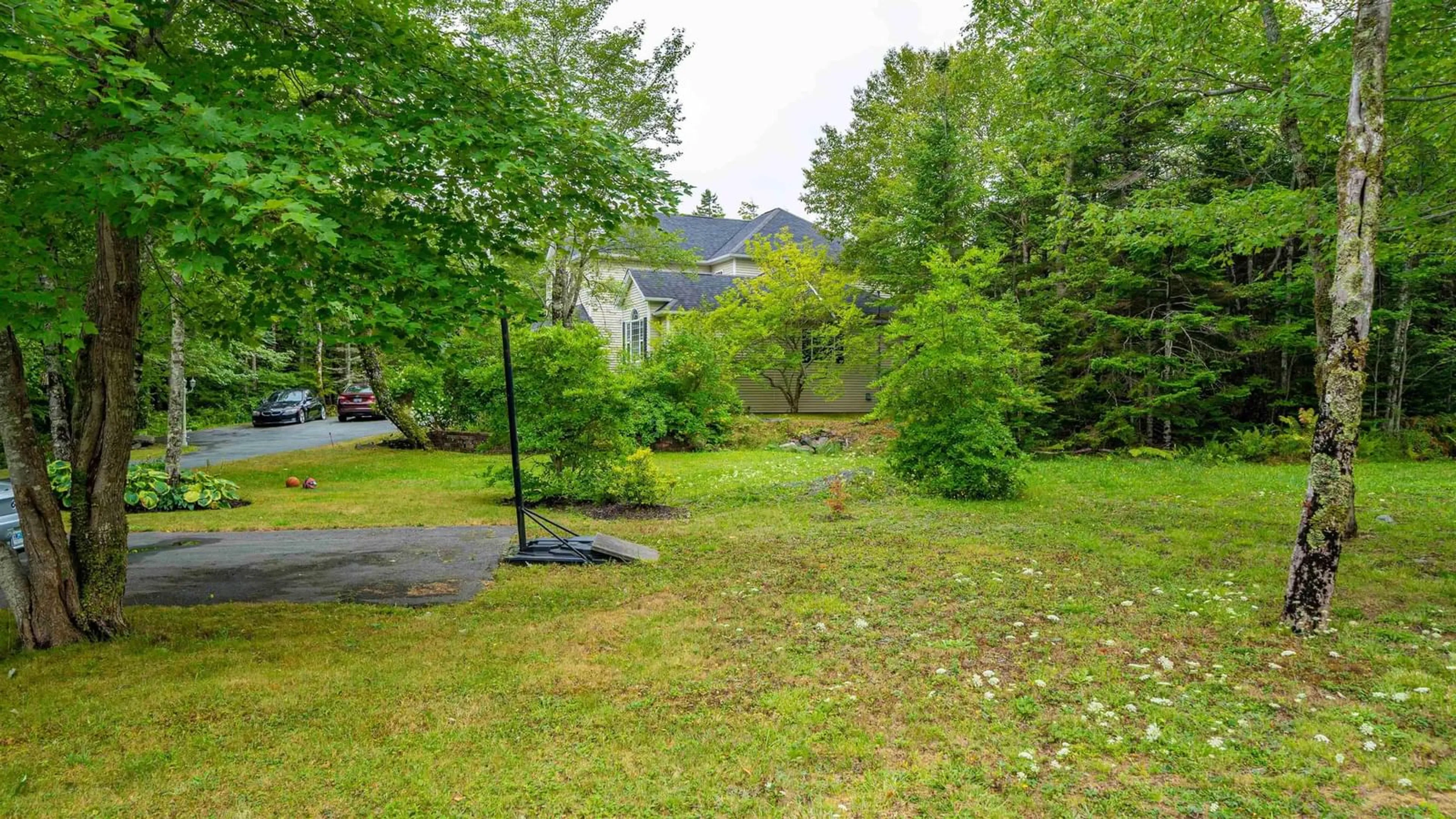 A pic from outside/outdoor area/front of a property/back of a property/a pic from drone, forest/trees view for 60 Blue Forest Lane, Hammonds Plains Nova Scotia B4B 1L1