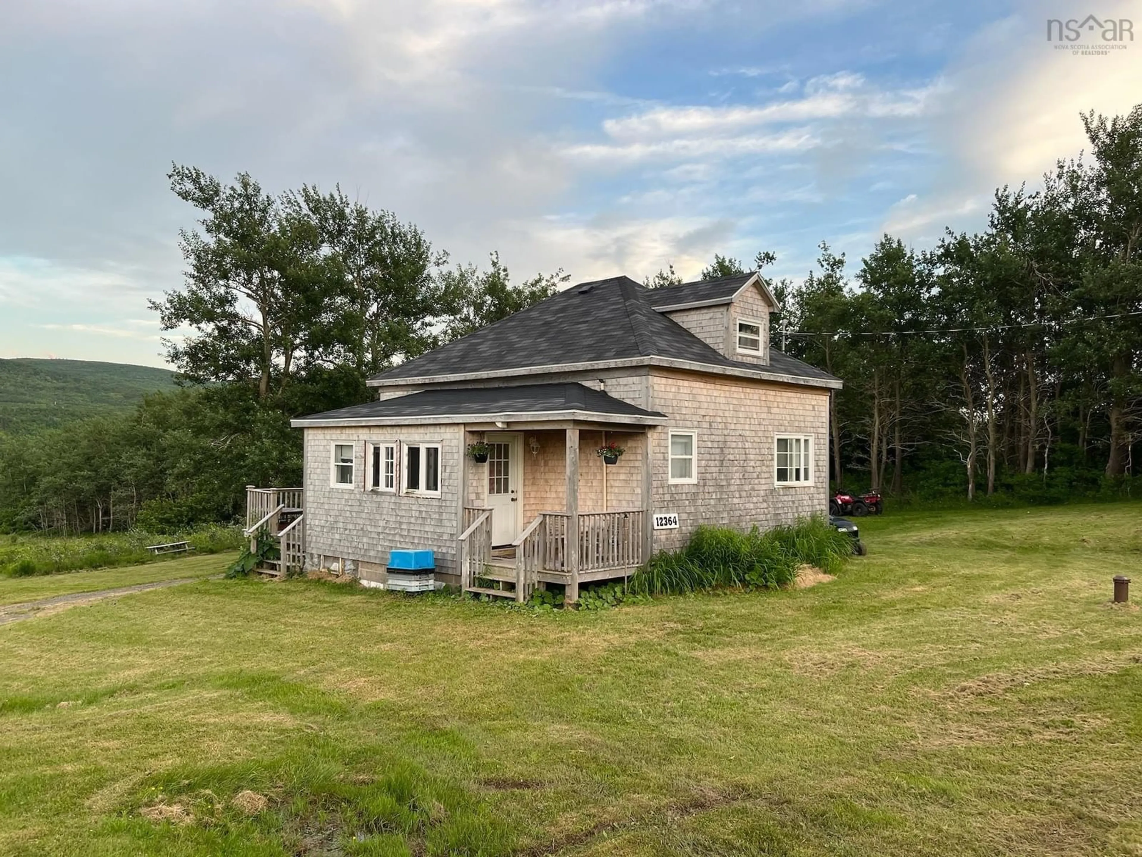 A pic from outside/outdoor area/front of a property/back of a property/a pic from drone, building for 12364 Cabot Trail, St. Joseph du Moine Nova Scotia B0E 3A0
