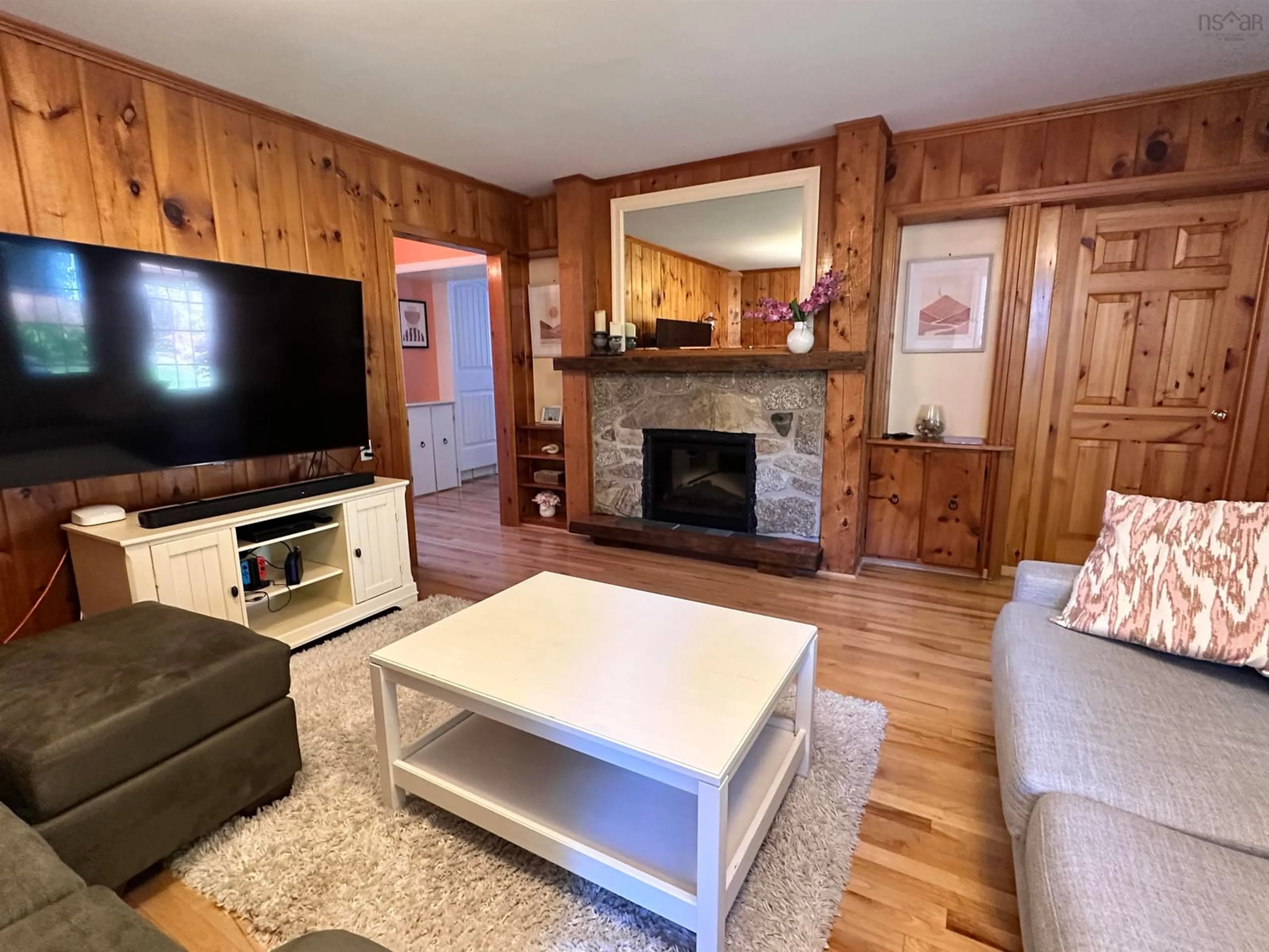 Living room with furniture, wood/laminate floor for 167 Church St, Liverpool Nova Scotia B0T 1K0