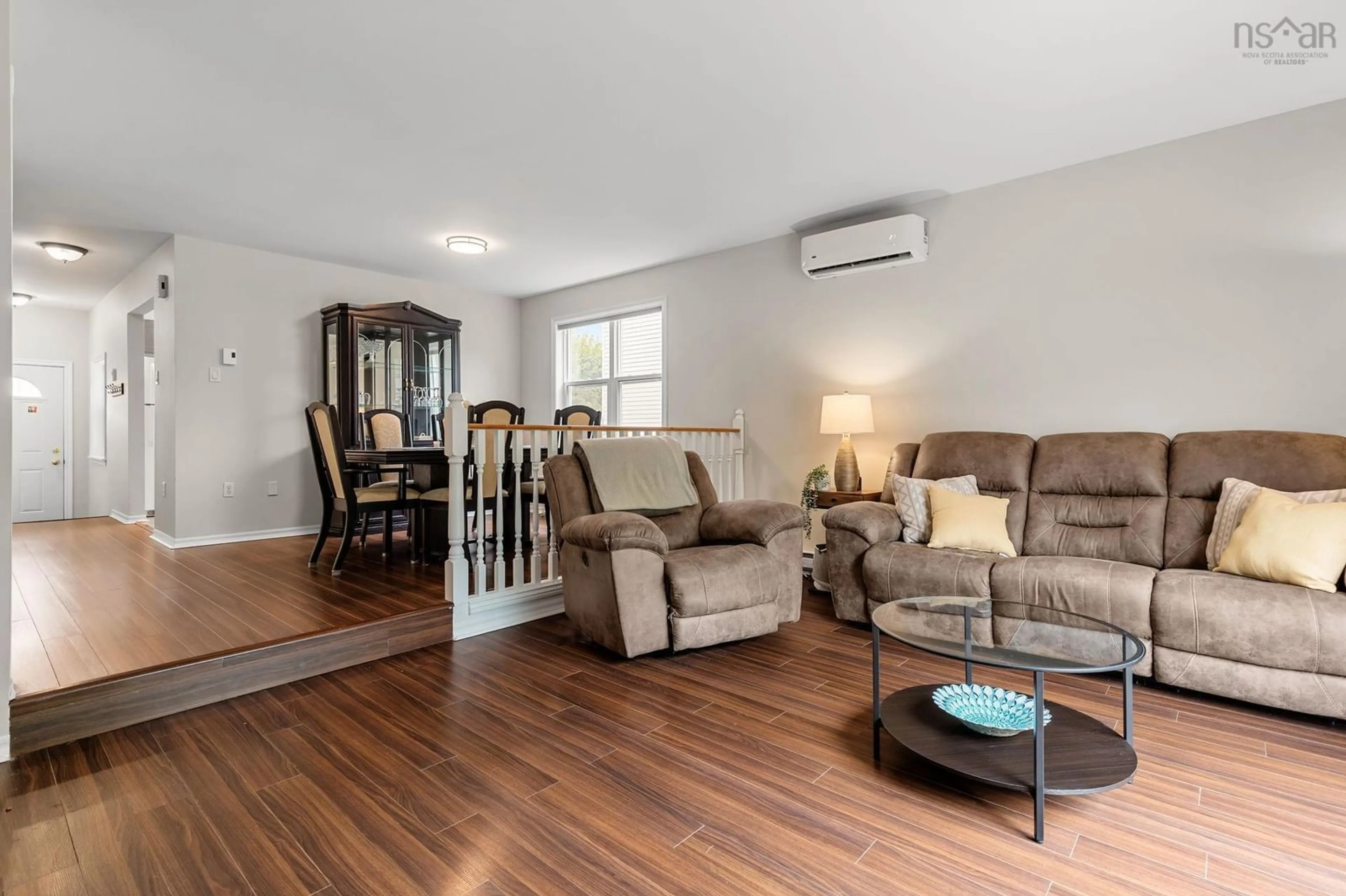 Living room with furniture, wood/laminate floor for 235 Greenwood Ave, Timberlea Nova Scotia B3T 1H8