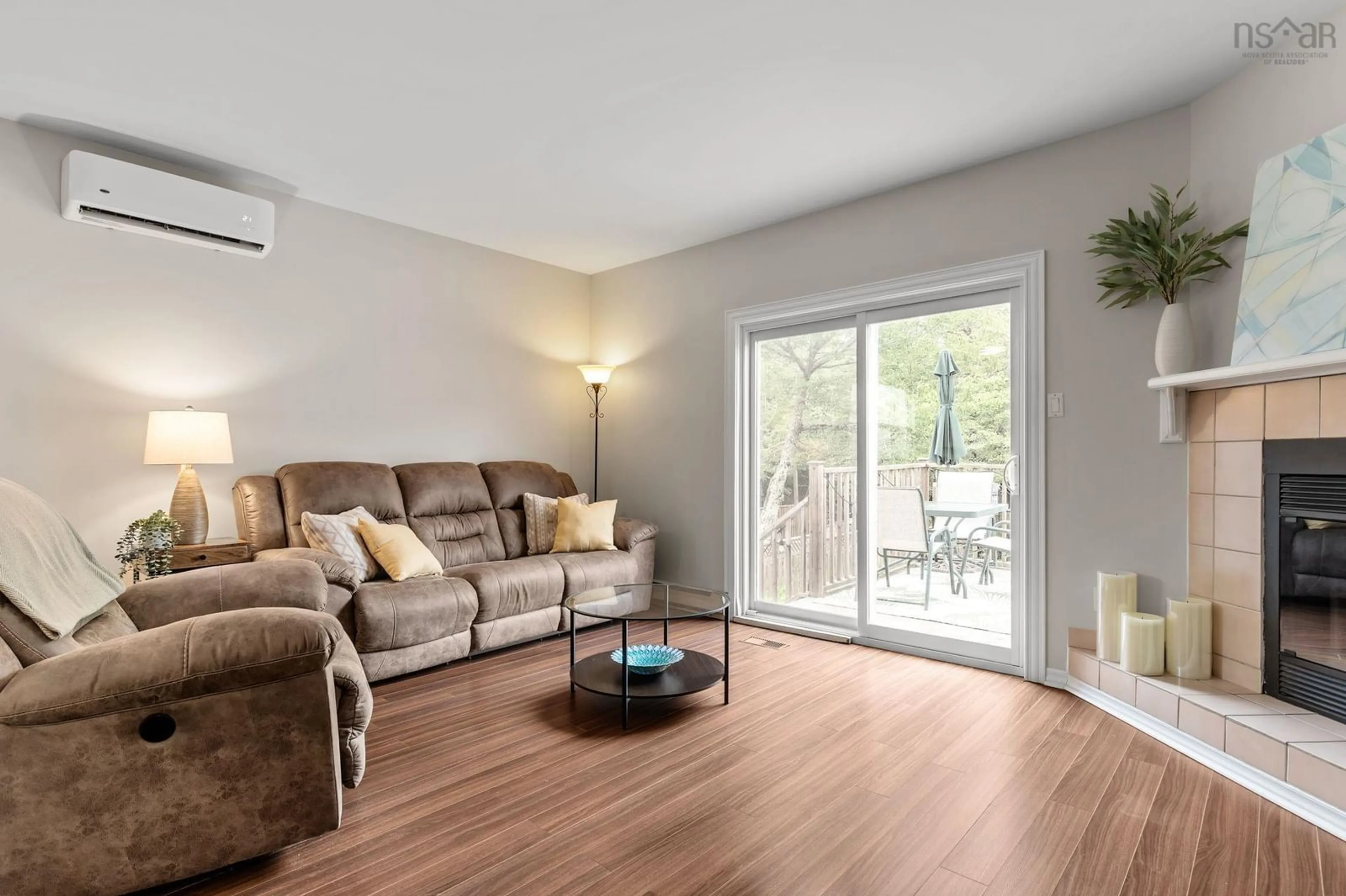 Living room with furniture, wood/laminate floor for 235 Greenwood Ave, Timberlea Nova Scotia B3T 1H8