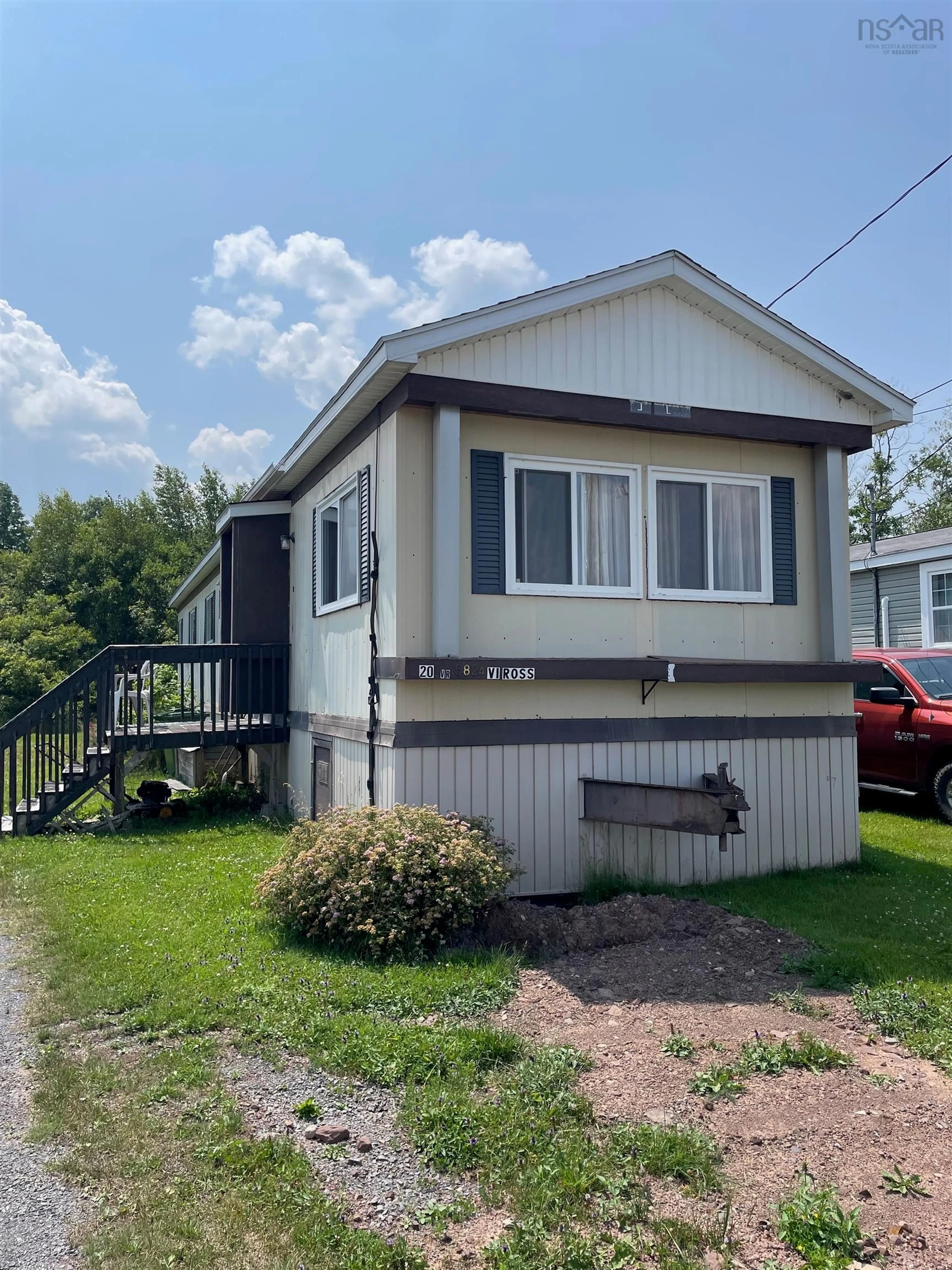 Home with vinyl exterior material, street for 20 5824 Rd, Riverton Nova Scotia B0K 1S0