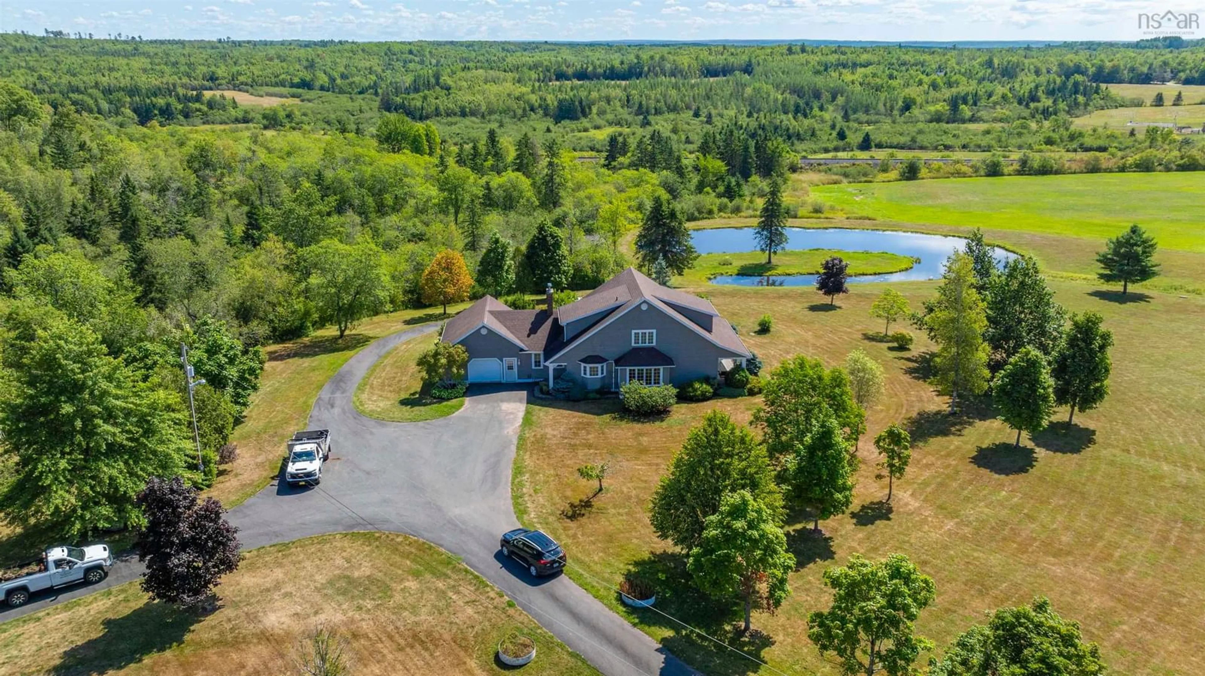 A pic from outside/outdoor area/front of a property/back of a property/a pic from drone, water/lake/river/ocean view for 1335 Highway 2, Brentwood Nova Scotia B0N 1C0