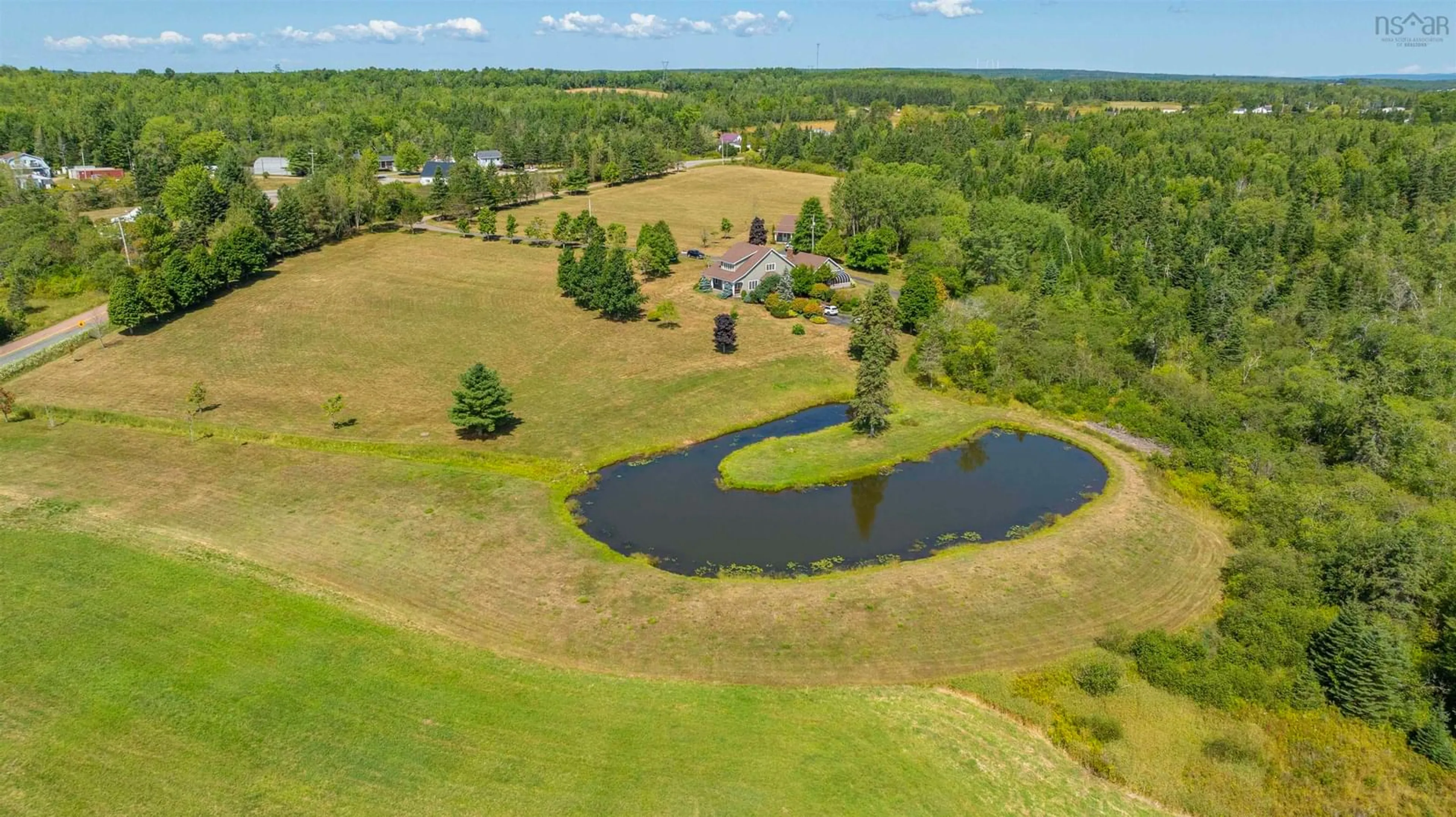 A pic from outside/outdoor area/front of a property/back of a property/a pic from drone, water/lake/river/ocean view for 1335 Highway 2, Brentwood Nova Scotia B0N 1C0