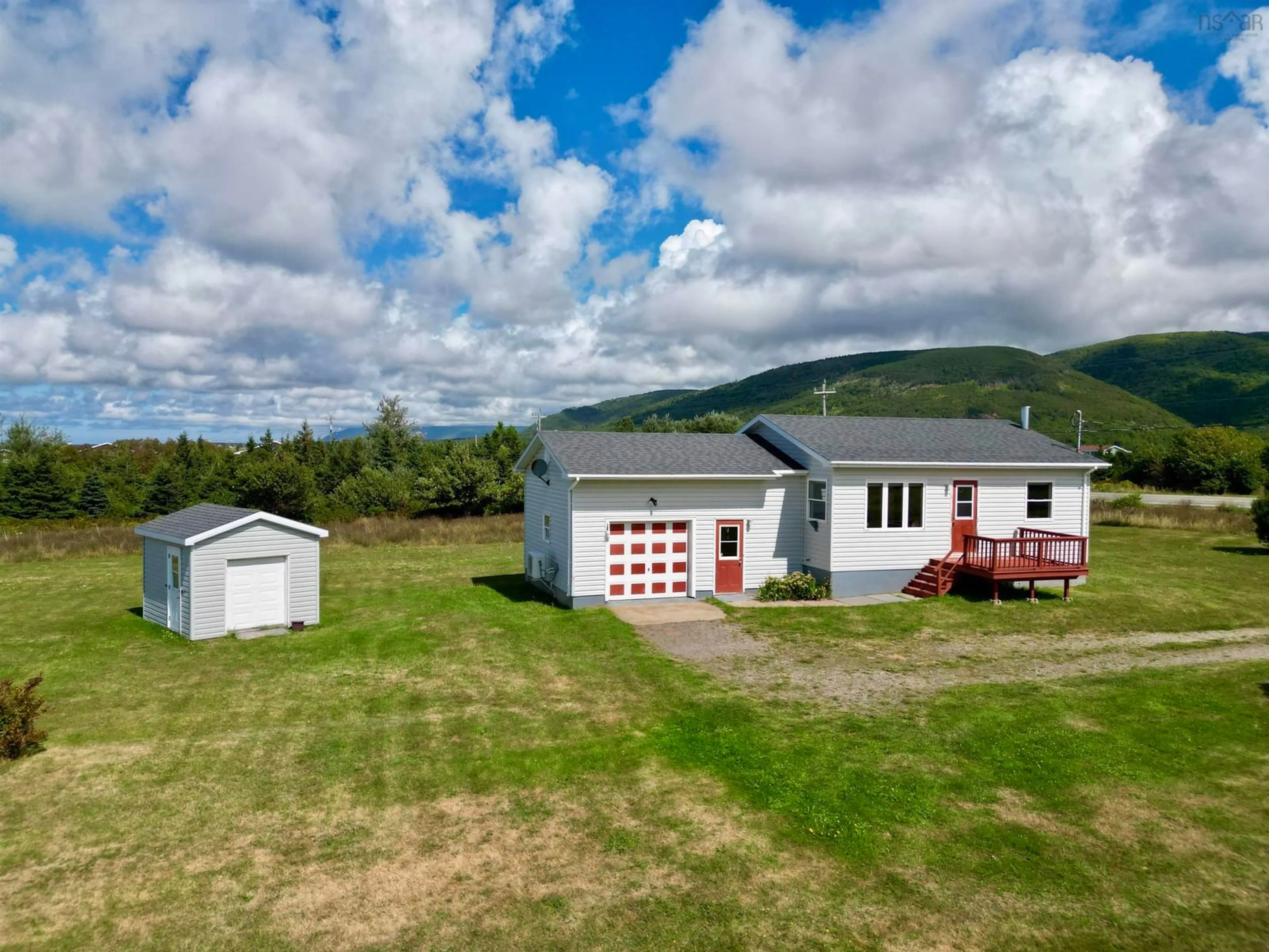 A pic from outside/outdoor area/front of a property/back of a property/a pic from drone, unknown for 13447 Cabot Trail Rd, Grand Étang Nova Scotia B0E 1L0