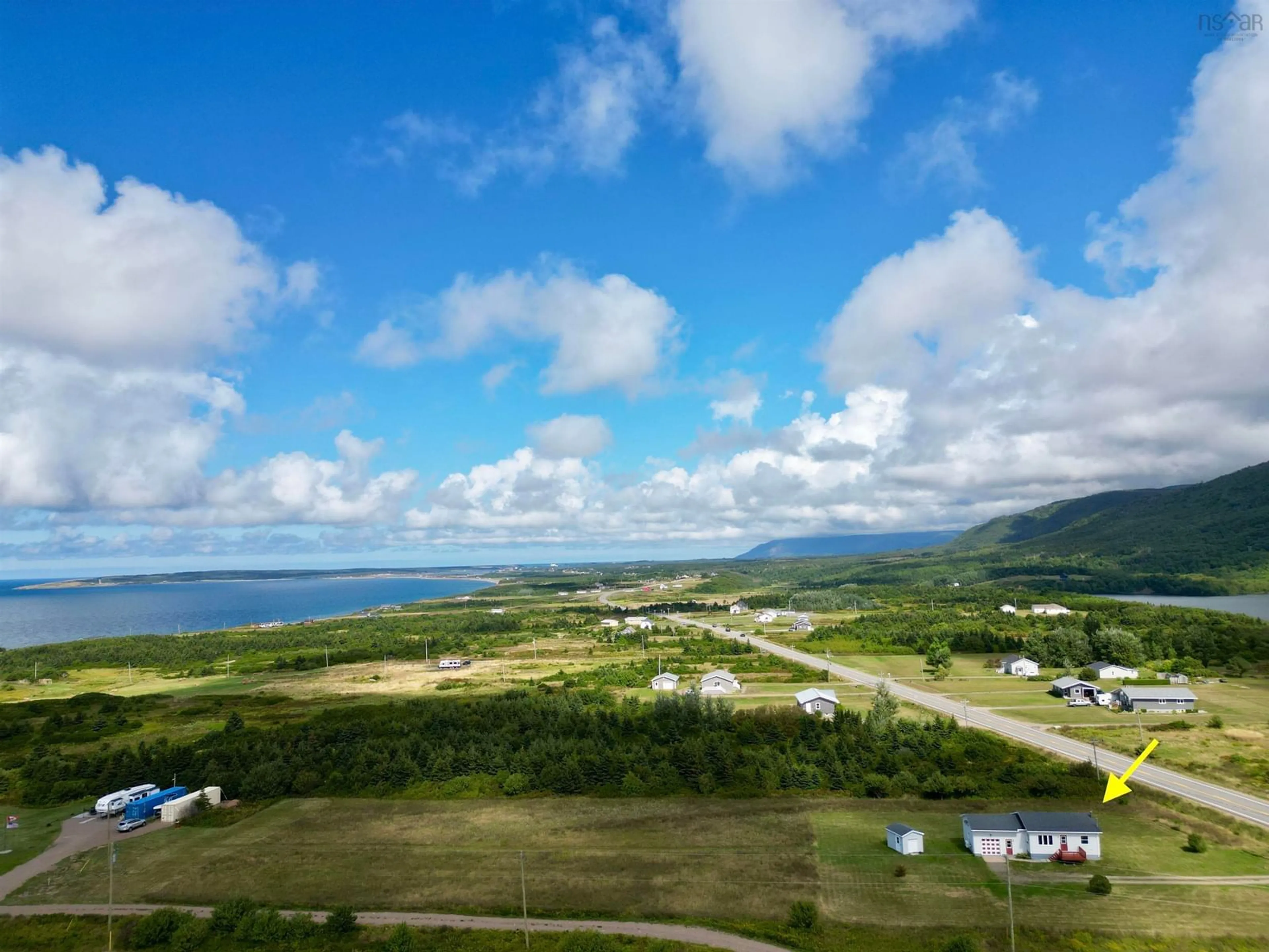 A pic from outside/outdoor area/front of a property/back of a property/a pic from drone, mountain view for 13447 Cabot Trail Rd, Grand Étang Nova Scotia B0E 1L0