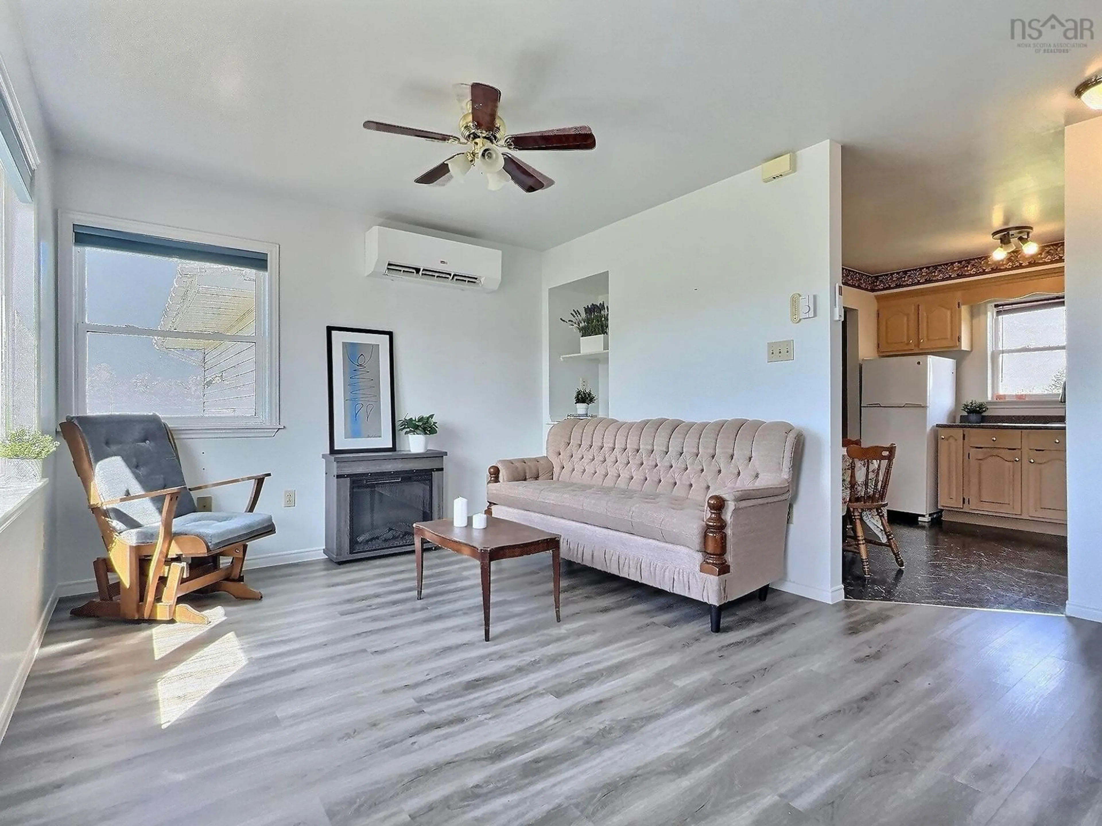 Living room with furniture, unknown for 13447 Cabot Trail Rd, Grand Étang Nova Scotia B0E 1L0