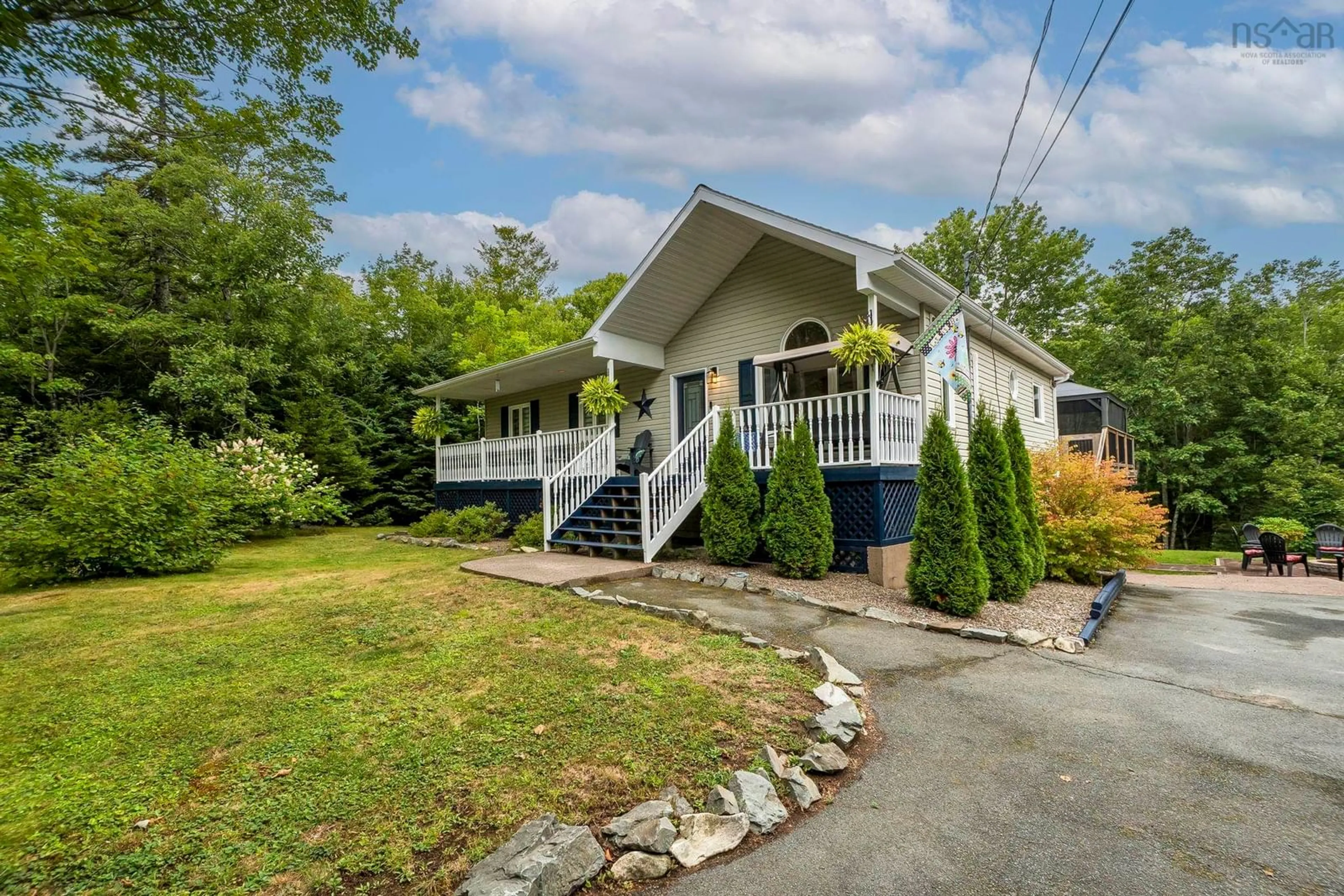 Home with vinyl exterior material, street for 15 Shepherds Lane, Lawrencetown Nova Scotia B2Z 1E6