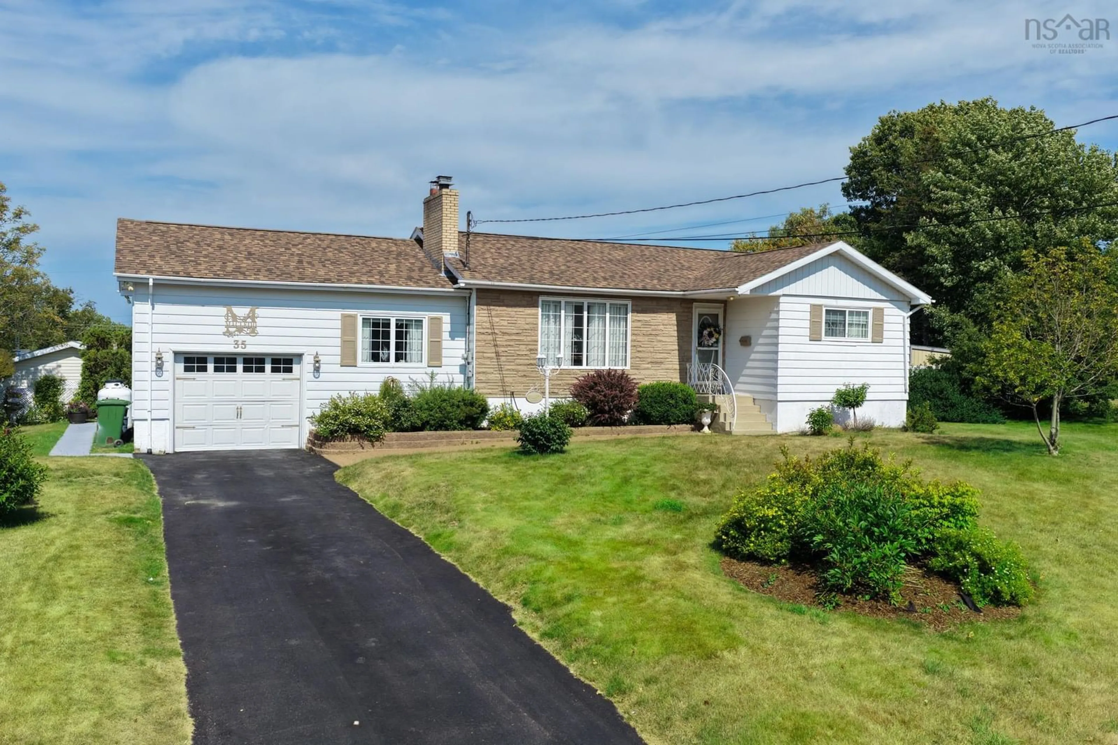 Home with vinyl exterior material, street for 35 Campbell St, North Sydney Nova Scotia B2A 2C6