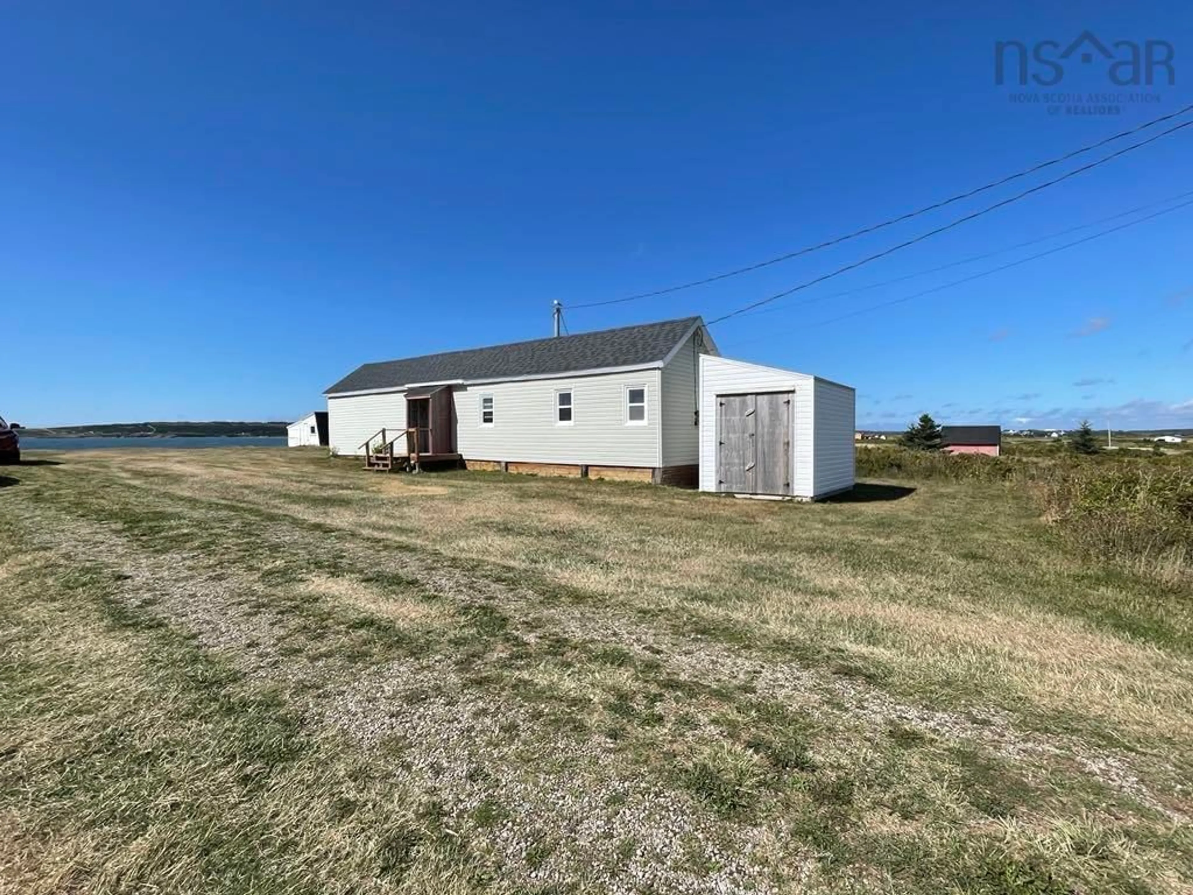 A pic from outside/outdoor area/front of a property/back of a property/a pic from drone, building for 125 Cheticamp Island Rd, Point Cross Nova Scotia B0E 1H0