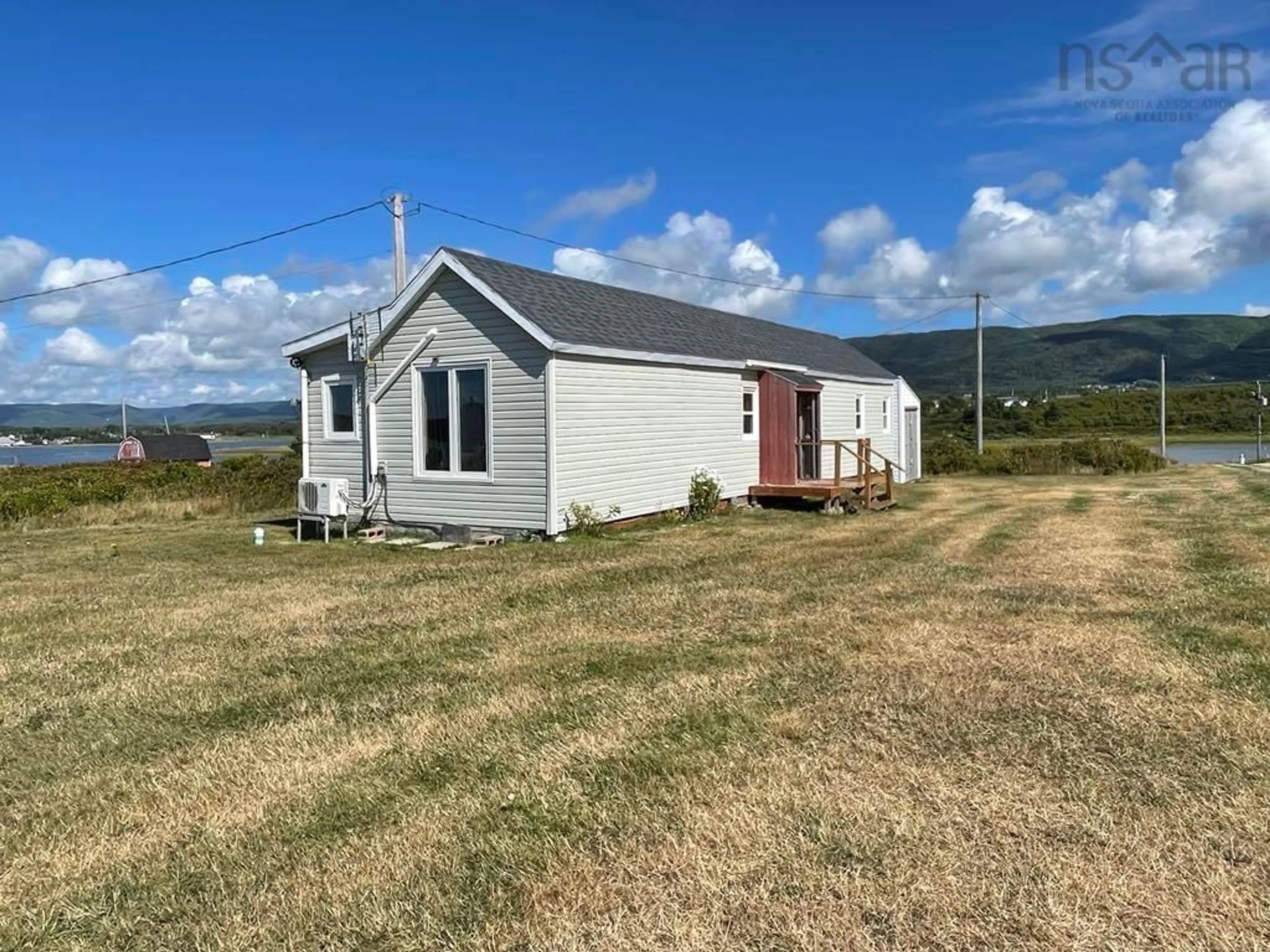 A pic from outside/outdoor area/front of a property/back of a property/a pic from drone, building for 125 Cheticamp Island Rd, Point Cross Nova Scotia B0E 1H0