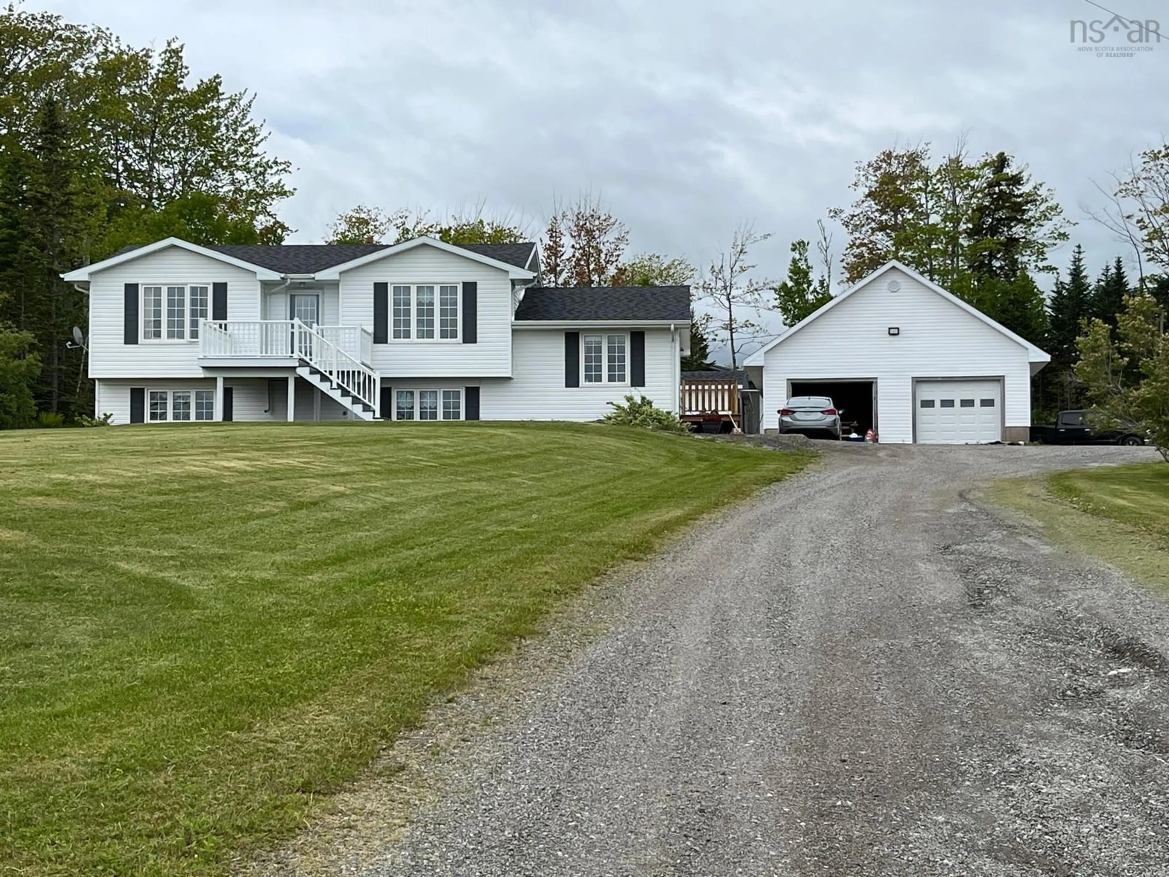 A pic from outside/outdoor area/front of a property/back of a property/a pic from drone, street for 49 Big Baddeck Rd, Baddeck Nova Scotia B0E 1B0