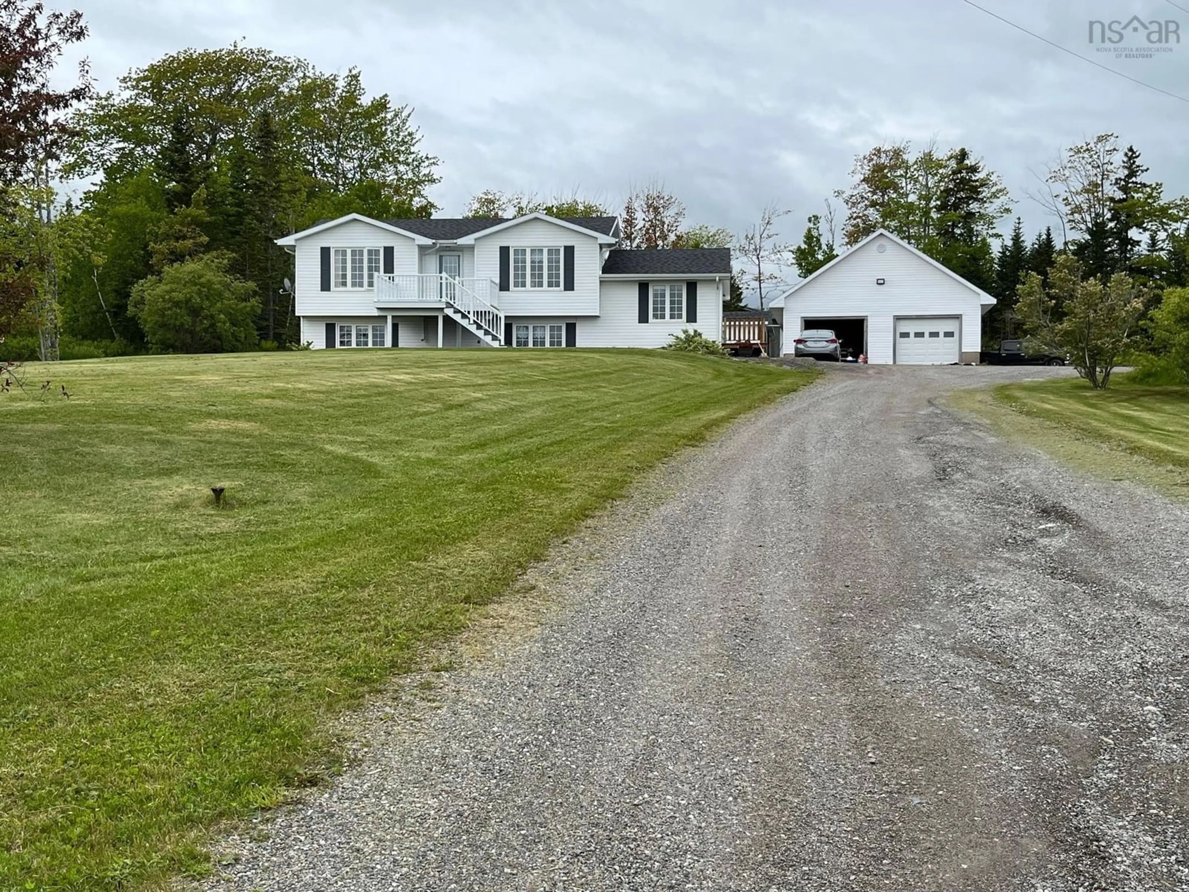 A pic from outside/outdoor area/front of a property/back of a property/a pic from drone, street for 49 Big Baddeck Rd, Baddeck Nova Scotia B0E 1B0