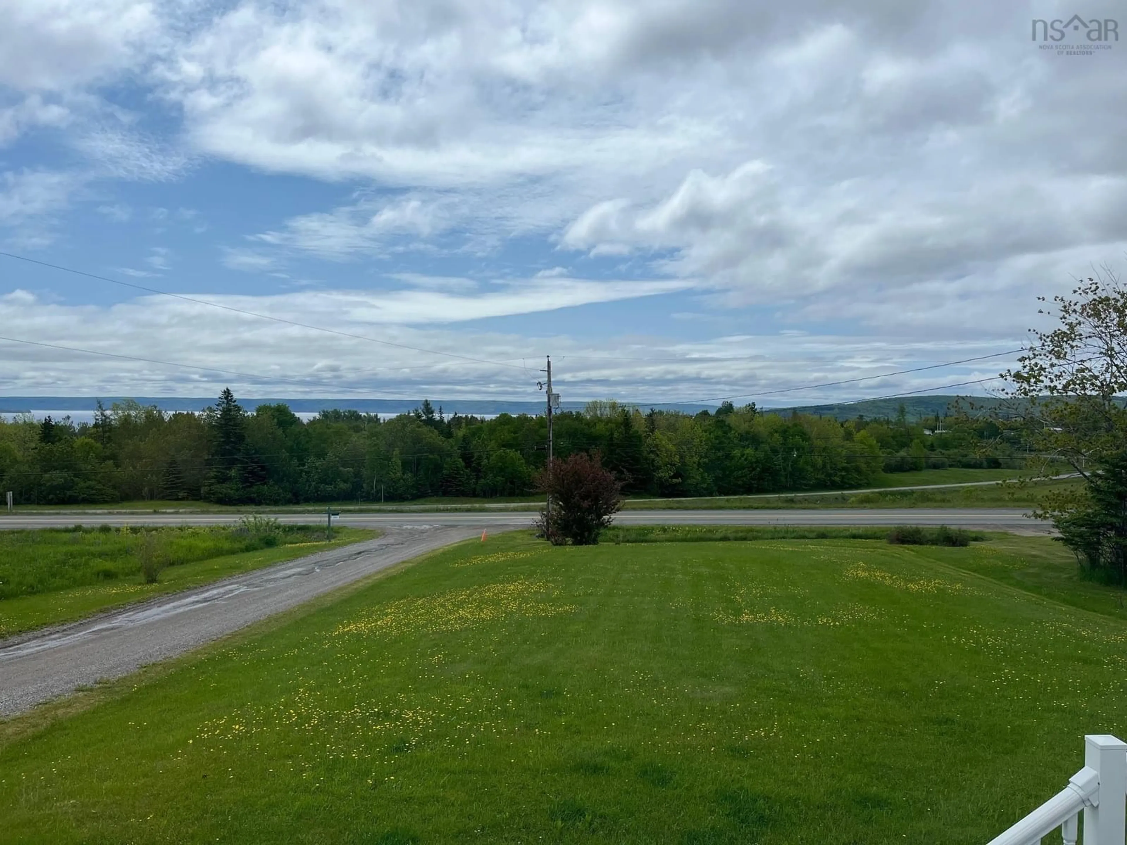 A pic from outside/outdoor area/front of a property/back of a property/a pic from drone, water/lake/river/ocean view for 49 Big Baddeck Rd, Baddeck Nova Scotia B0E 1B0