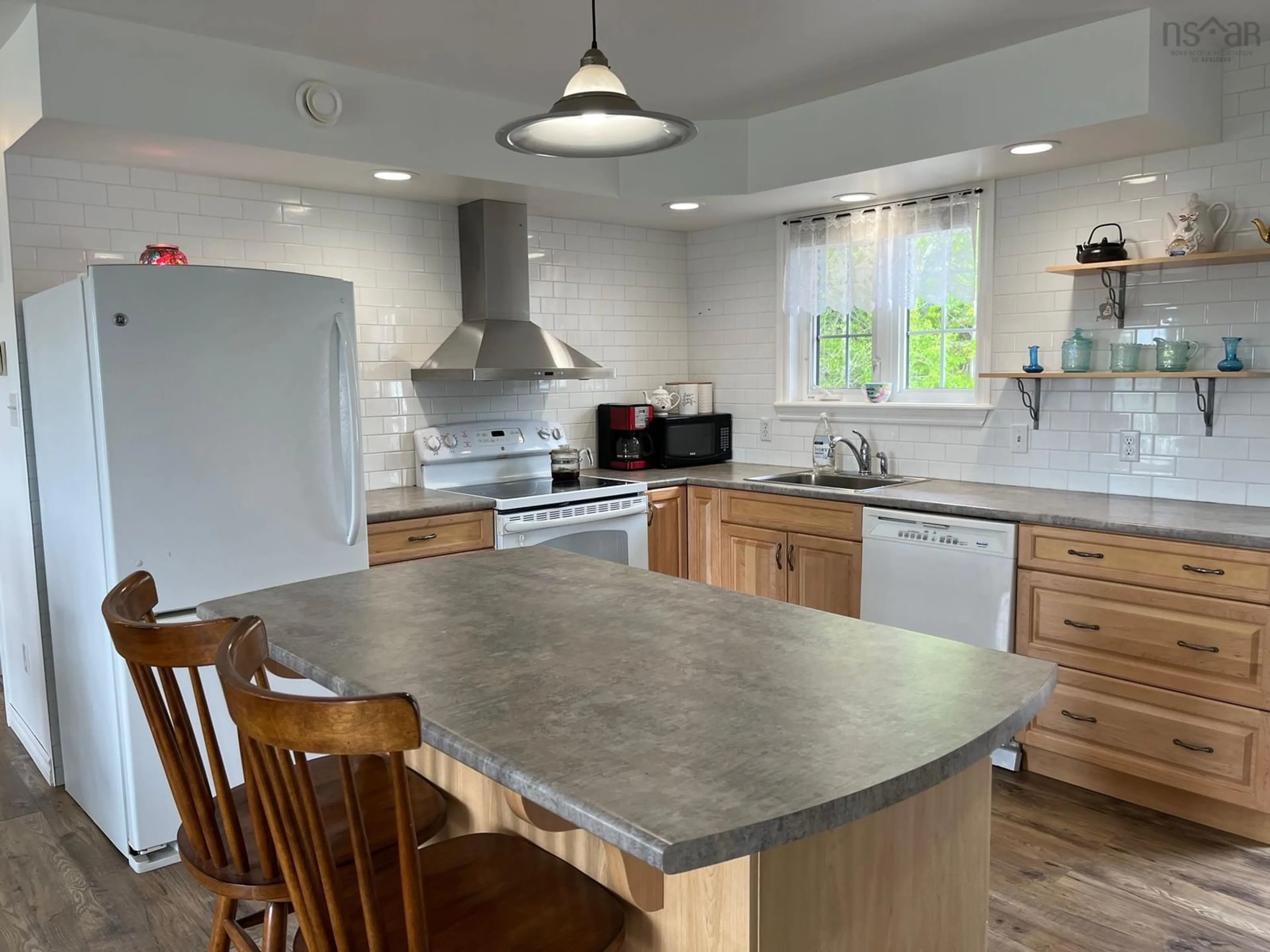 Open concept kitchen, unknown for 49 Big Baddeck Rd, Baddeck Nova Scotia B0E 1B0
