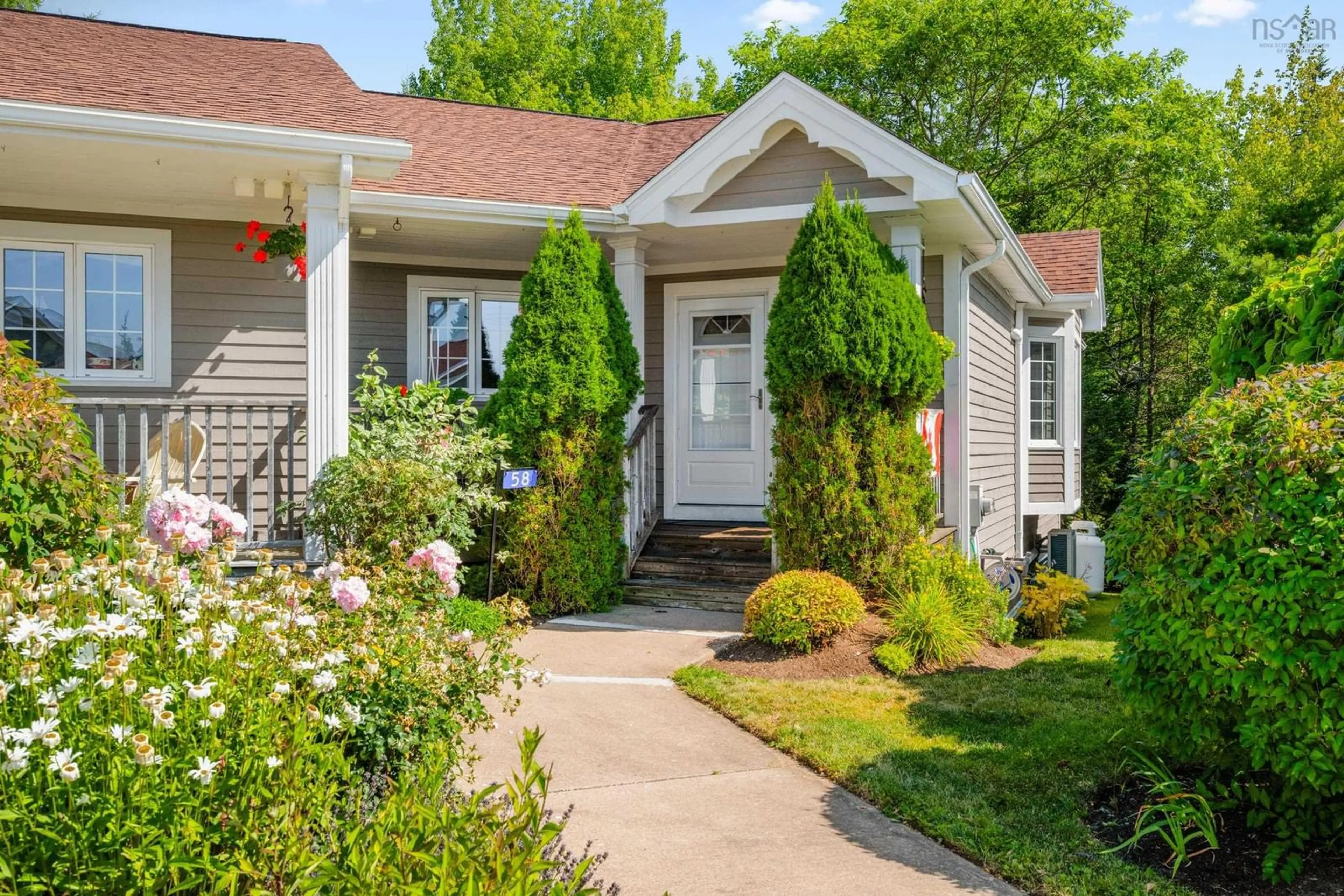 Home with vinyl exterior material, street for 58 Millennium Dr, Chester Nova Scotia B0J 1J0