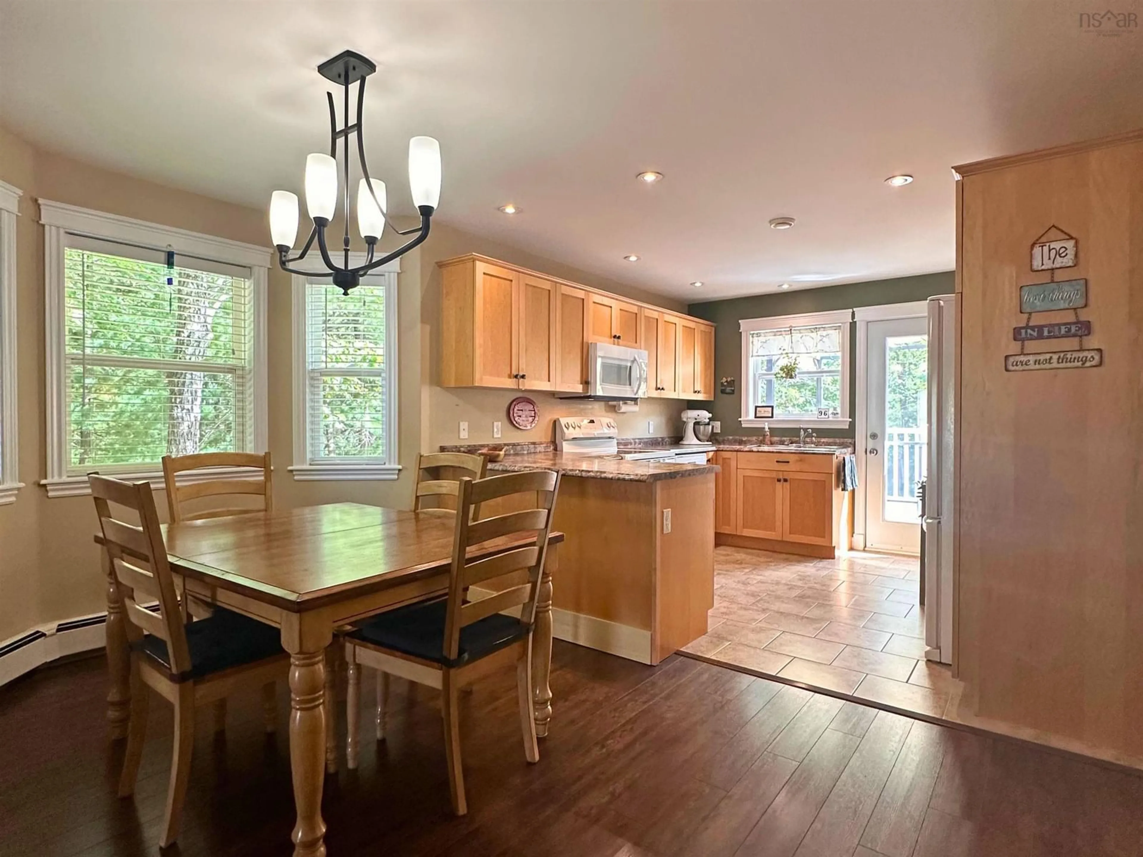 Open concept kitchen, wood/laminate floor for 96 Etna St, Bridgewater Nova Scotia B4V 8Z4