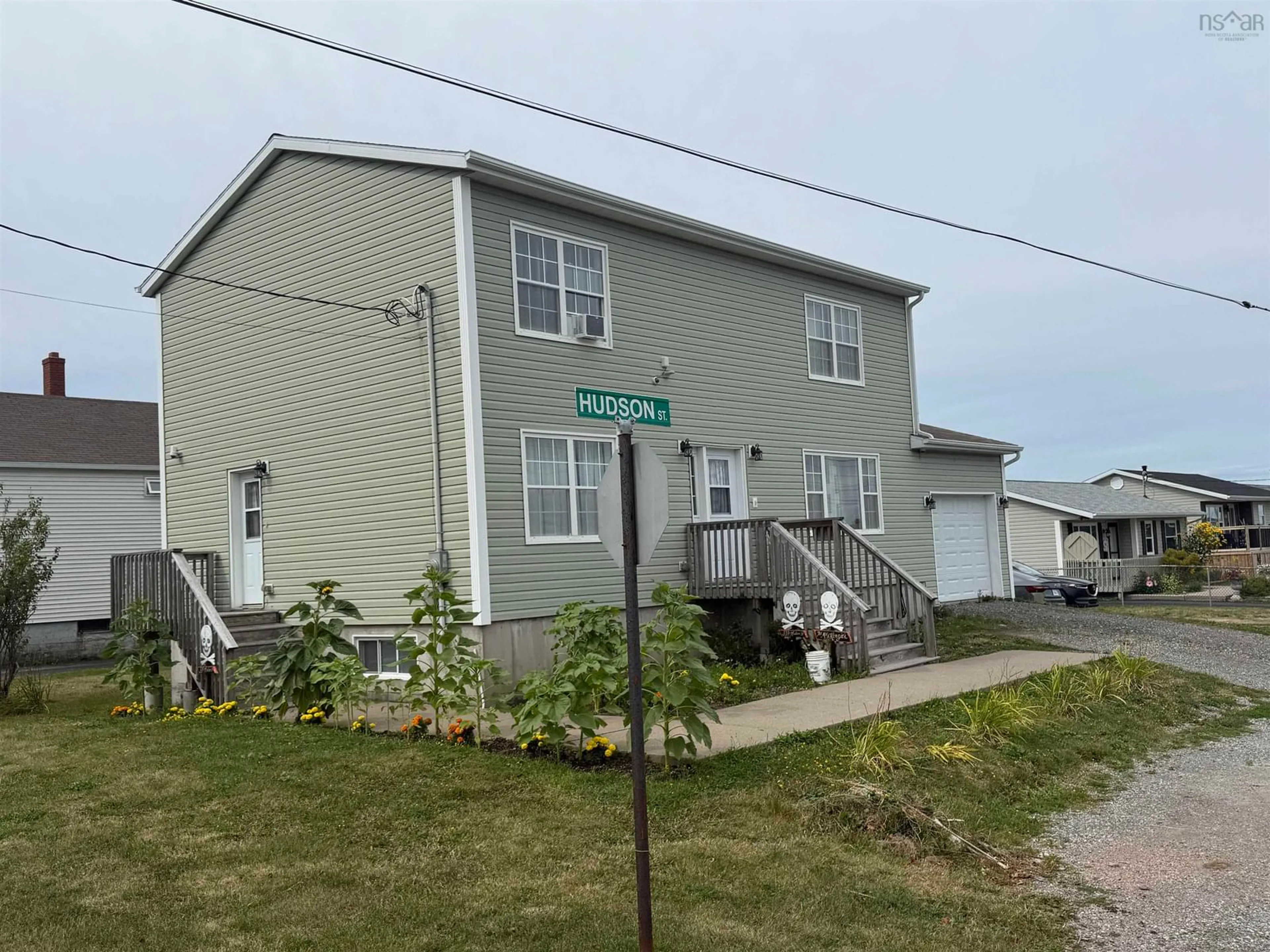 A pic from outside/outdoor area/front of a property/back of a property/a pic from drone, street for 339 Hudson St, New Waterford Nova Scotia B1E 3P7