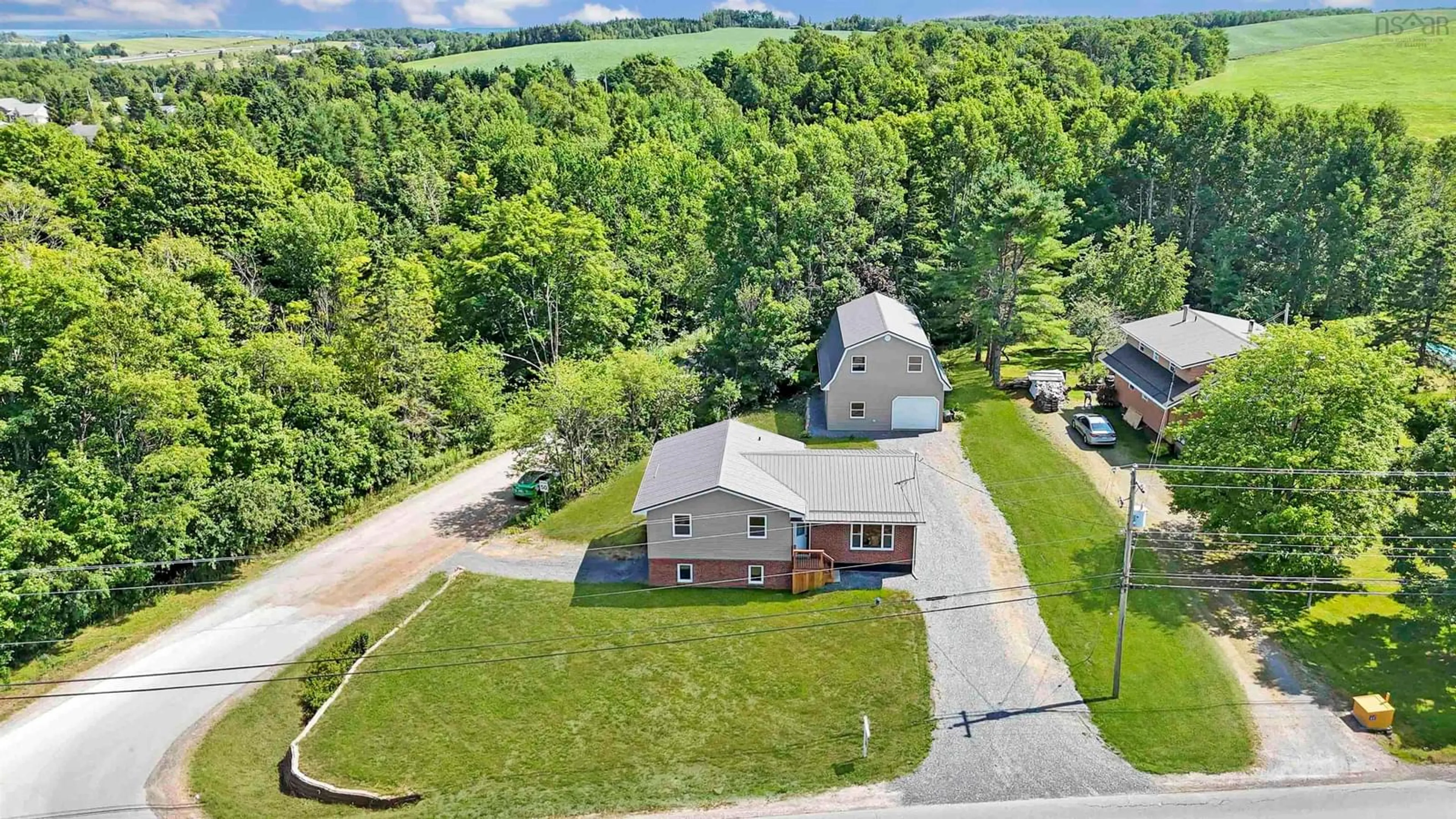 A pic from outside/outdoor area/front of a property/back of a property/a pic from drone, water/lake/river/ocean view for 39 Robinson Rd, Mill Village Nova Scotia B0N 2H0