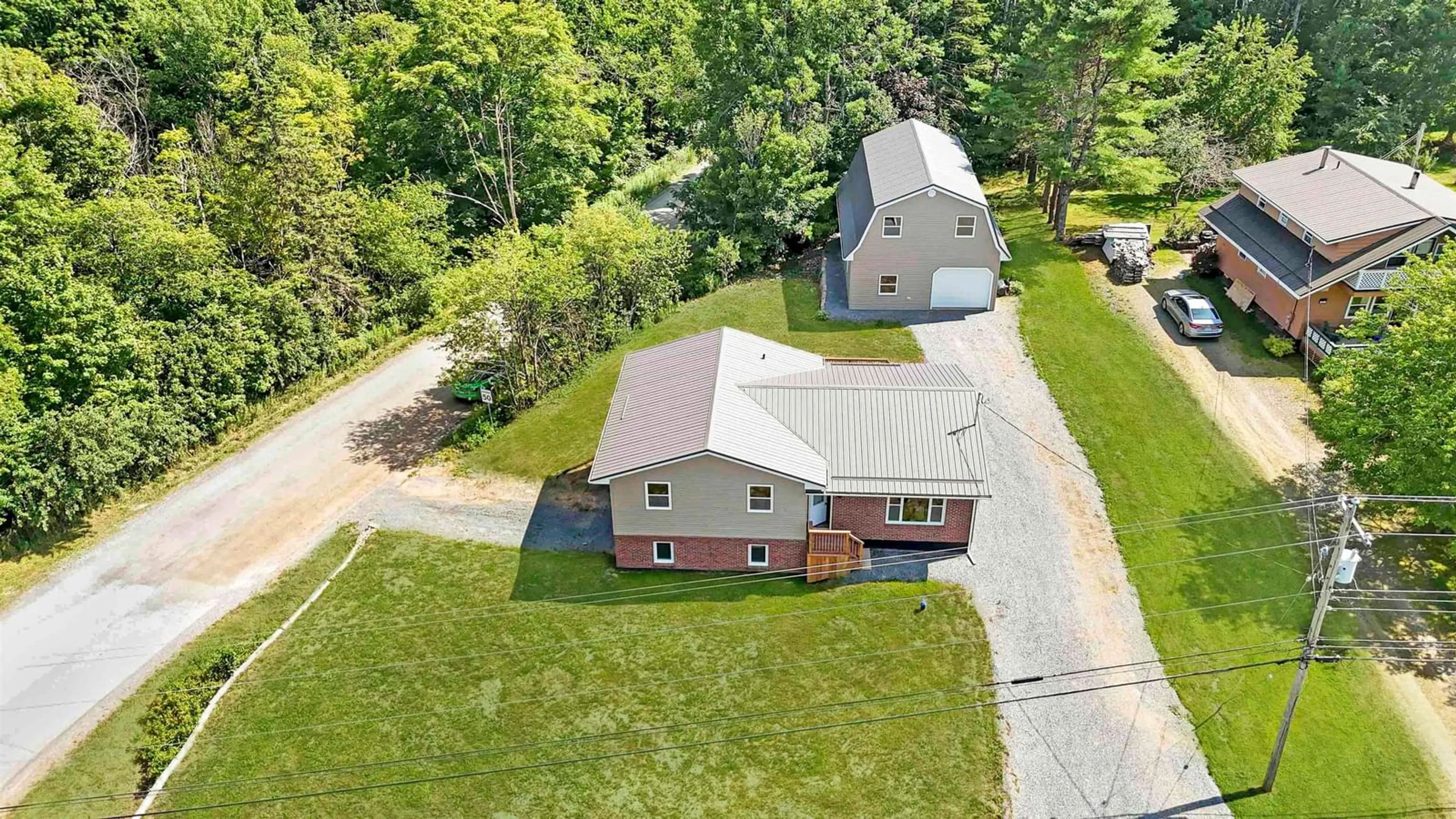 A pic from outside/outdoor area/front of a property/back of a property/a pic from drone, street for 39 Robinson Rd, Mill Village Nova Scotia B0N 2H0