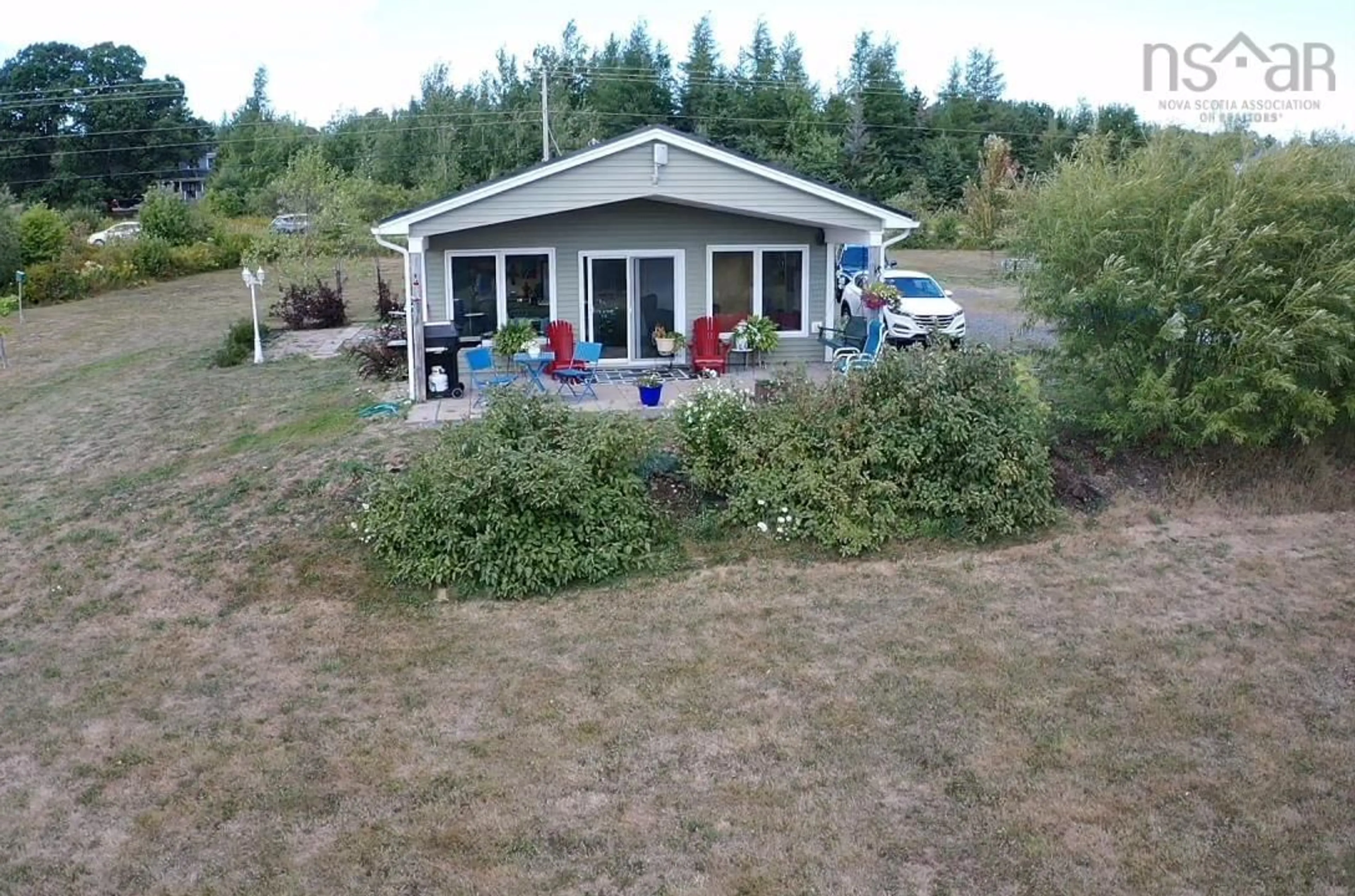 A pic from outside/outdoor area/front of a property/back of a property/a pic from drone, unknown for 2080 Malagash Rd, Malagash Nova Scotia B0K 1G0