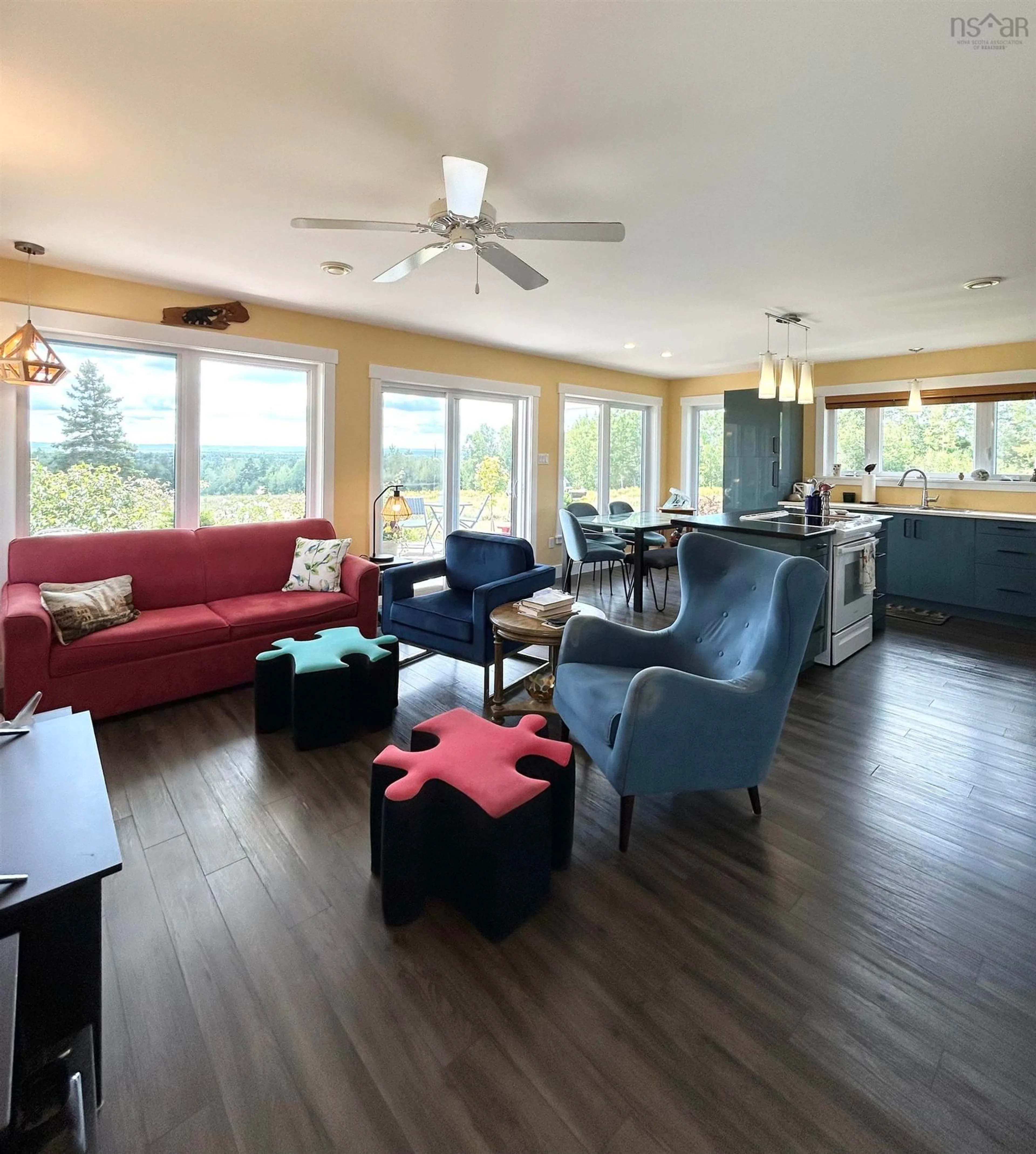 Living room with furniture, wood/laminate floor for 2080 Malagash Rd, Malagash Nova Scotia B0K 1G0