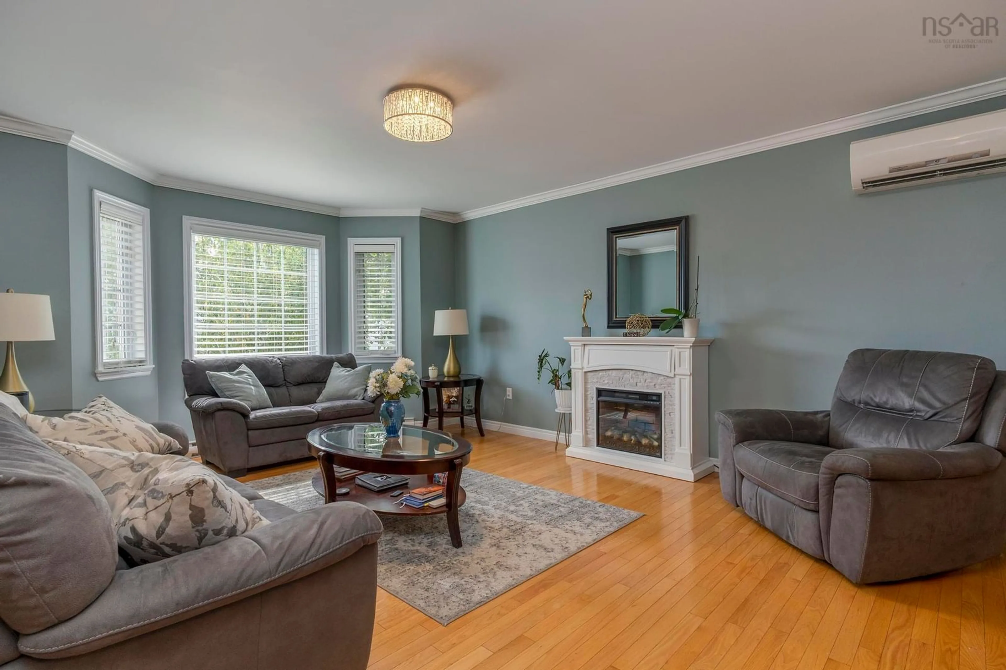 Living room with furniture, wood/laminate floor for 39 Ridgecrest Drive, Bridgewater Nova Scotia B4V 3V8
