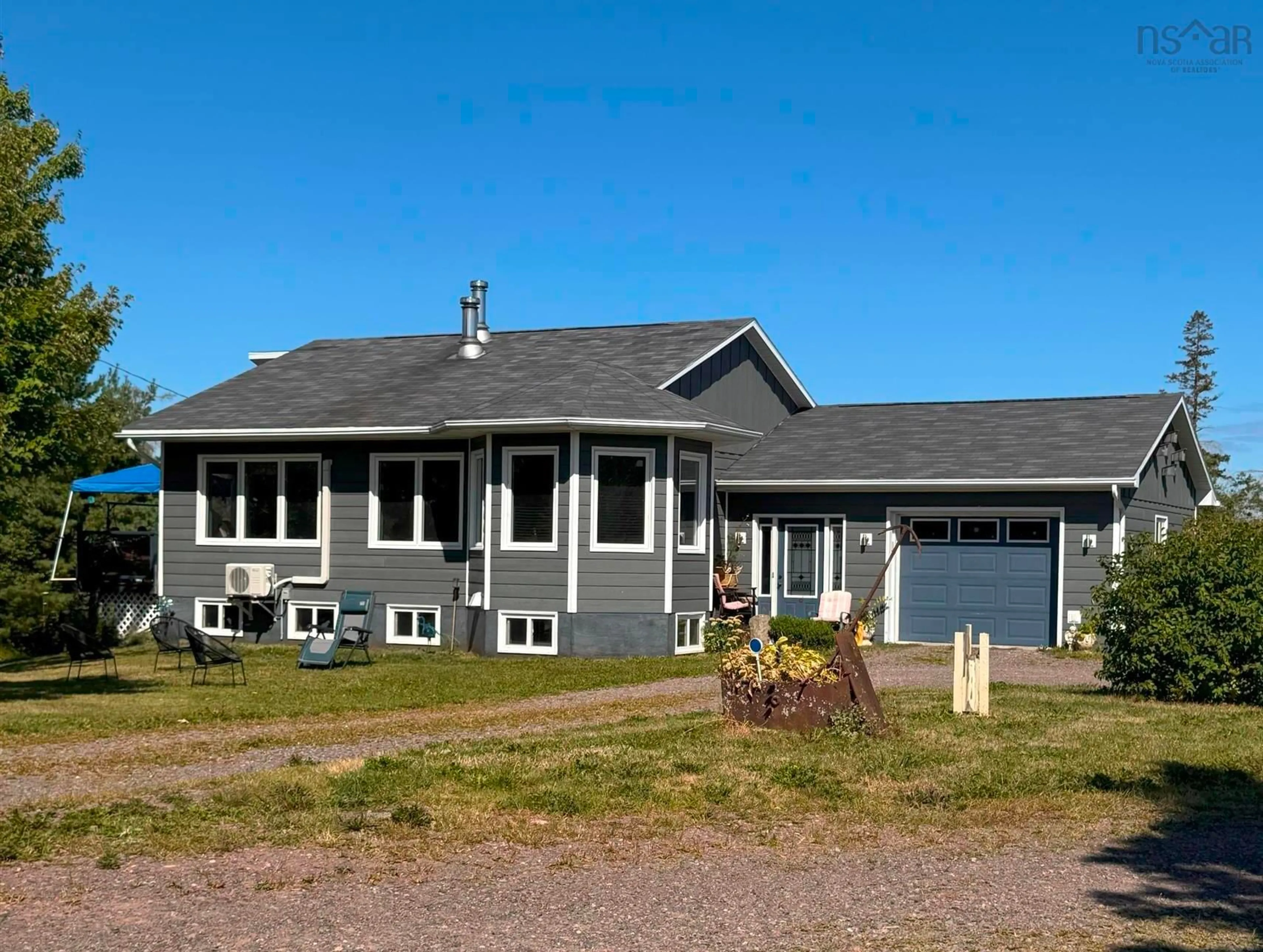 Home with vinyl exterior material, street for 615 New Rd, Melville Nova Scotia B0K 1N0
