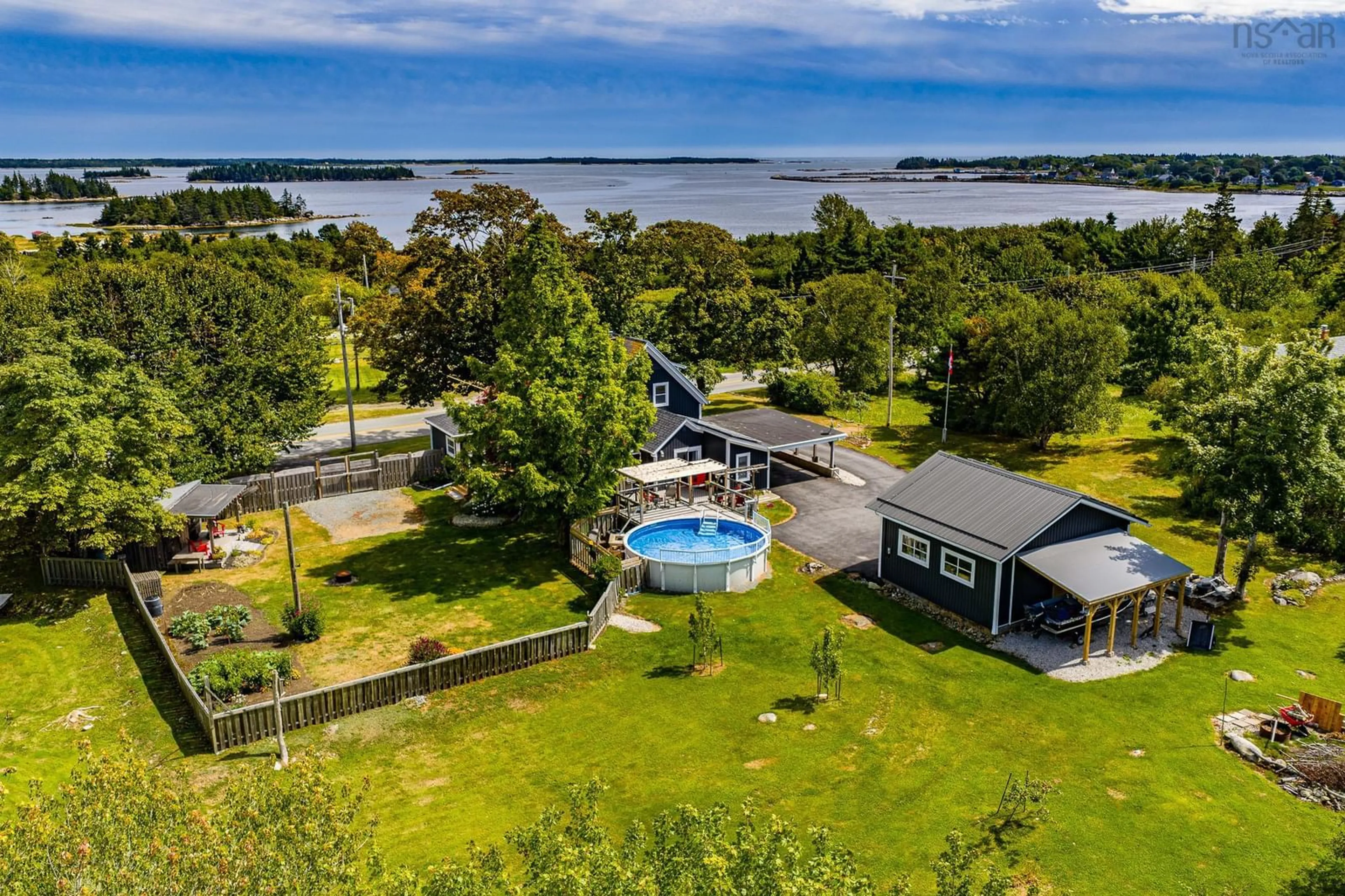 A pic from outside/outdoor area/front of a property/back of a property/a pic from drone, water/lake/river/ocean view for 327 Brighton Rd, Lockeport Nova Scotia B0T 1L0
