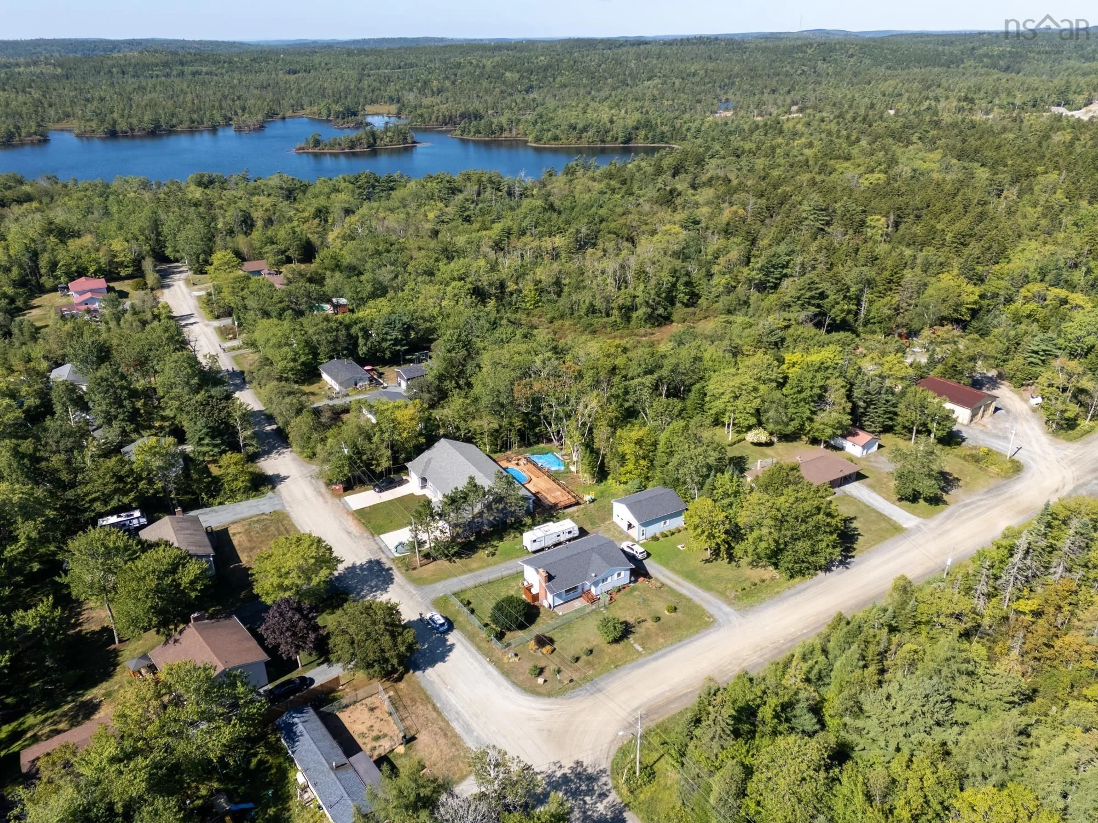 A pic from outside/outdoor area/front of a property/back of a property/a pic from drone, water/lake/river/ocean view for 19 Lake Dr, Mount Uniacke Nova Scotia B0N 1Z0