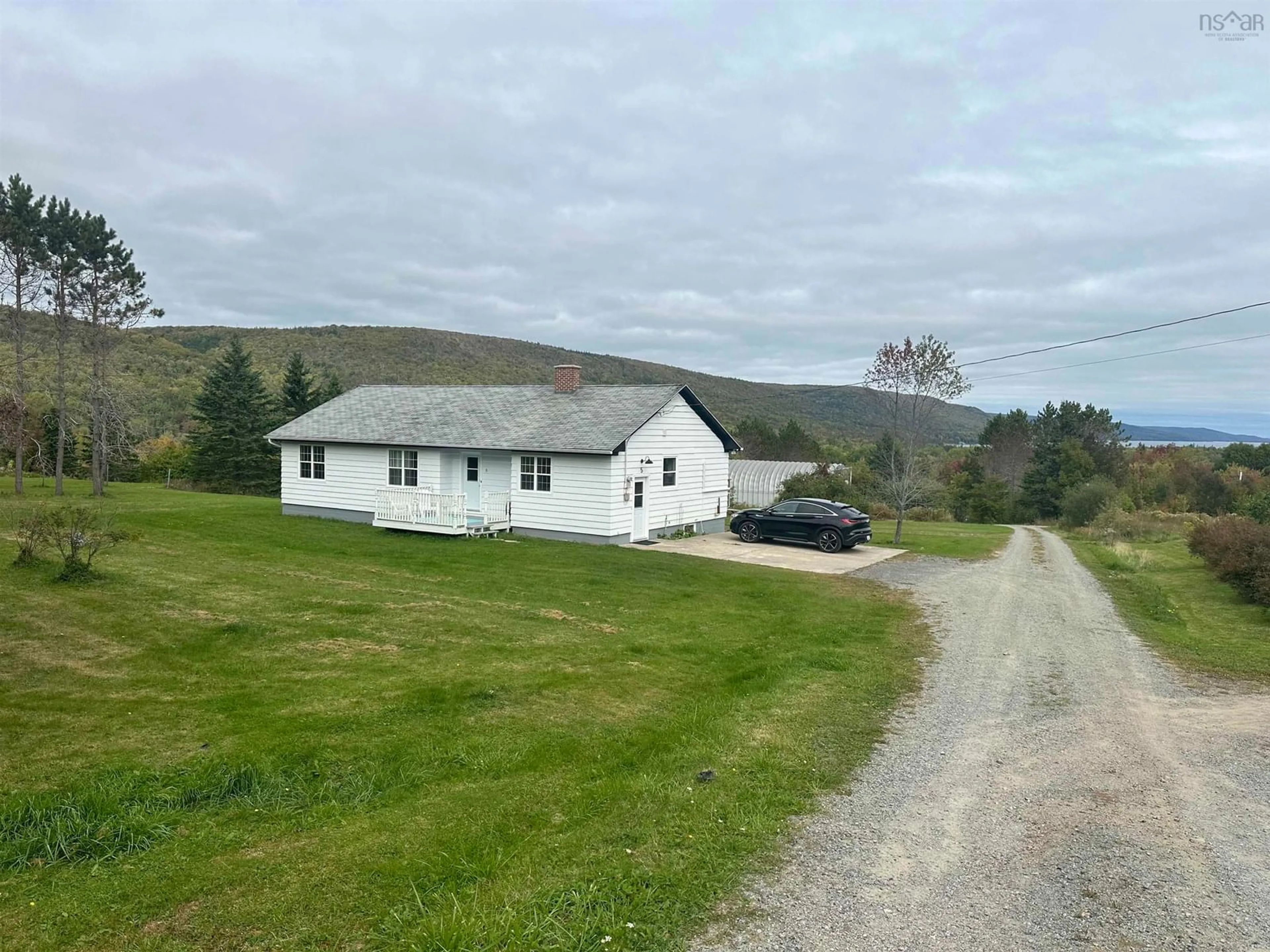 A pic from outside/outdoor area/front of a property/back of a property/a pic from drone, mountain view for 5 Eagles Nest Dr, West Bay Marshes Nova Scotia B0E 3K0