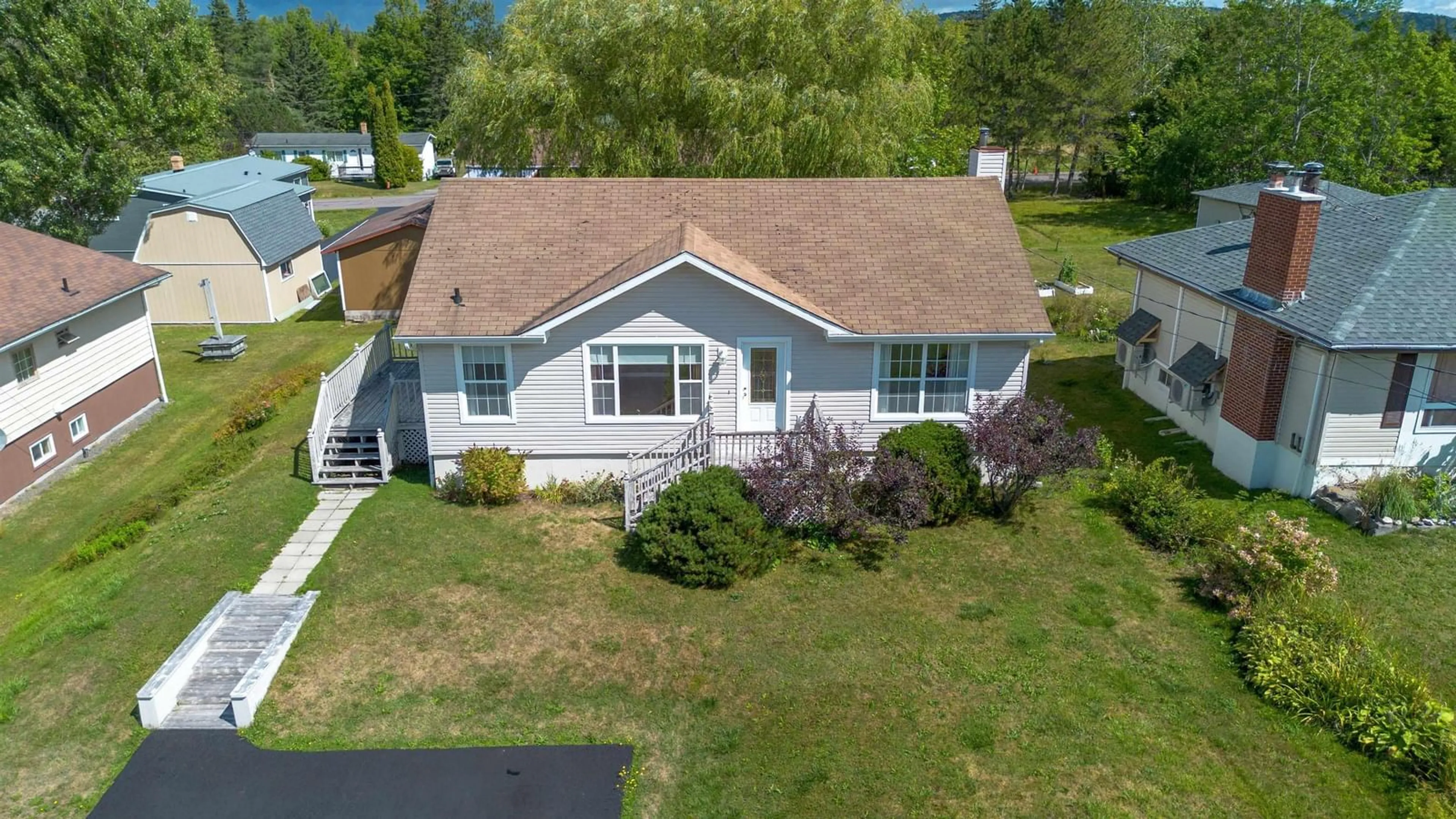A pic from outside/outdoor area/front of a property/back of a property/a pic from drone, street for 174 Twining St, Baddeck Nova Scotia B0E 1B0