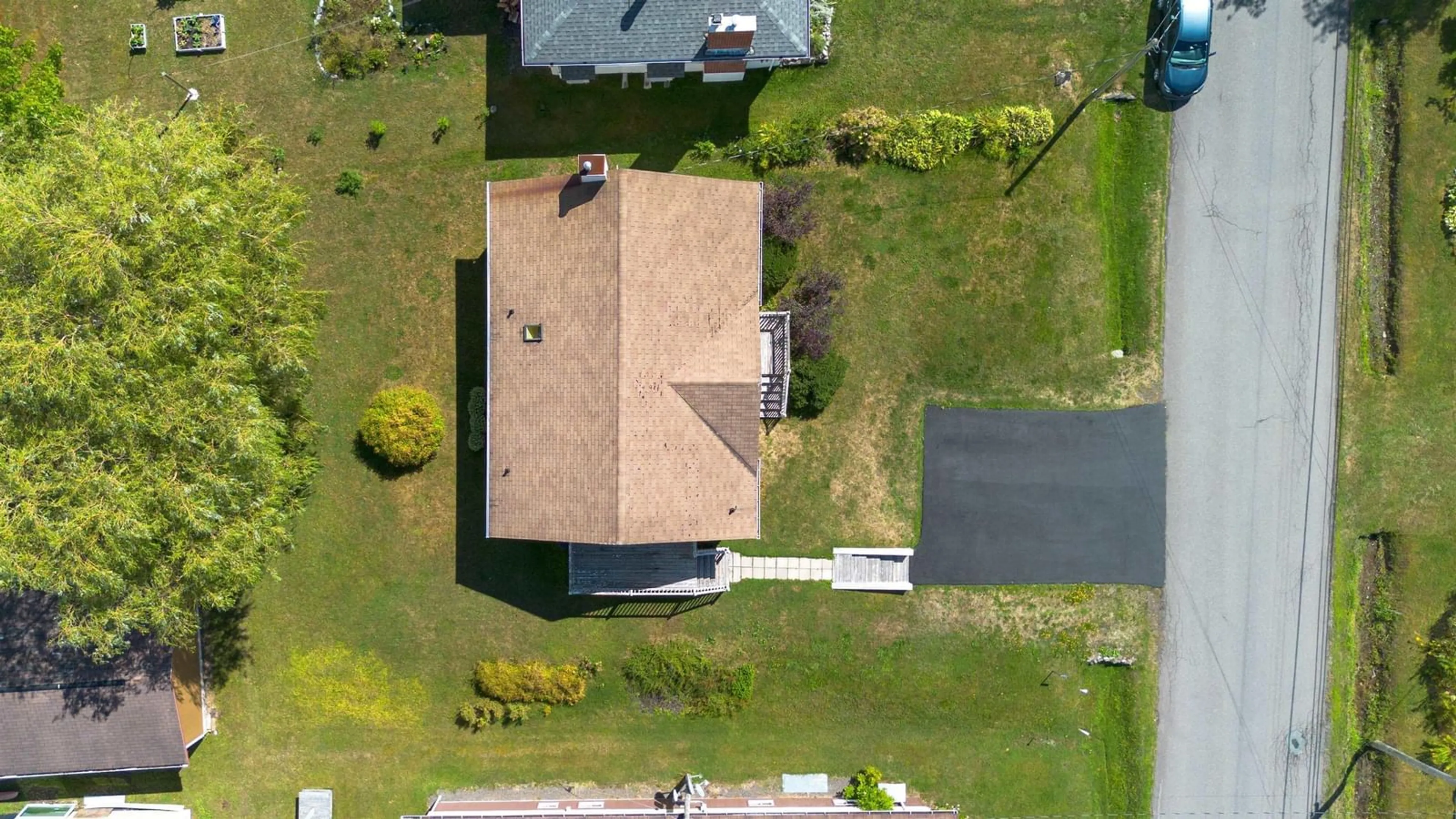 A pic from outside/outdoor area/front of a property/back of a property/a pic from drone, unknown for 174 Twining St, Baddeck Nova Scotia B0E 1B0
