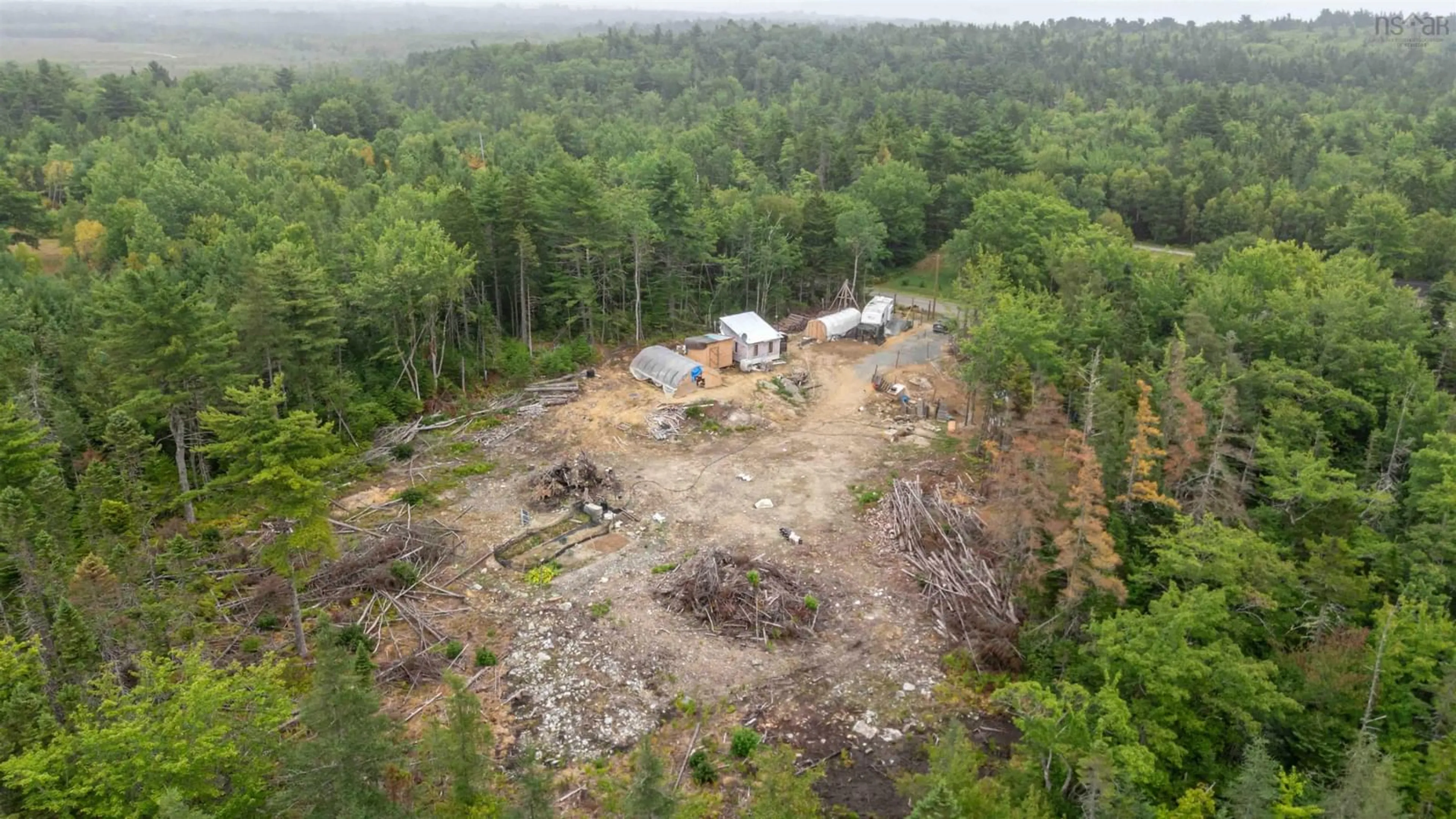 A pic from outside/outdoor area/front of a property/back of a property/a pic from drone, forest/trees view for 100 Llewellyn Loop Rd, Middlewood Nova Scotia B4V 6L4