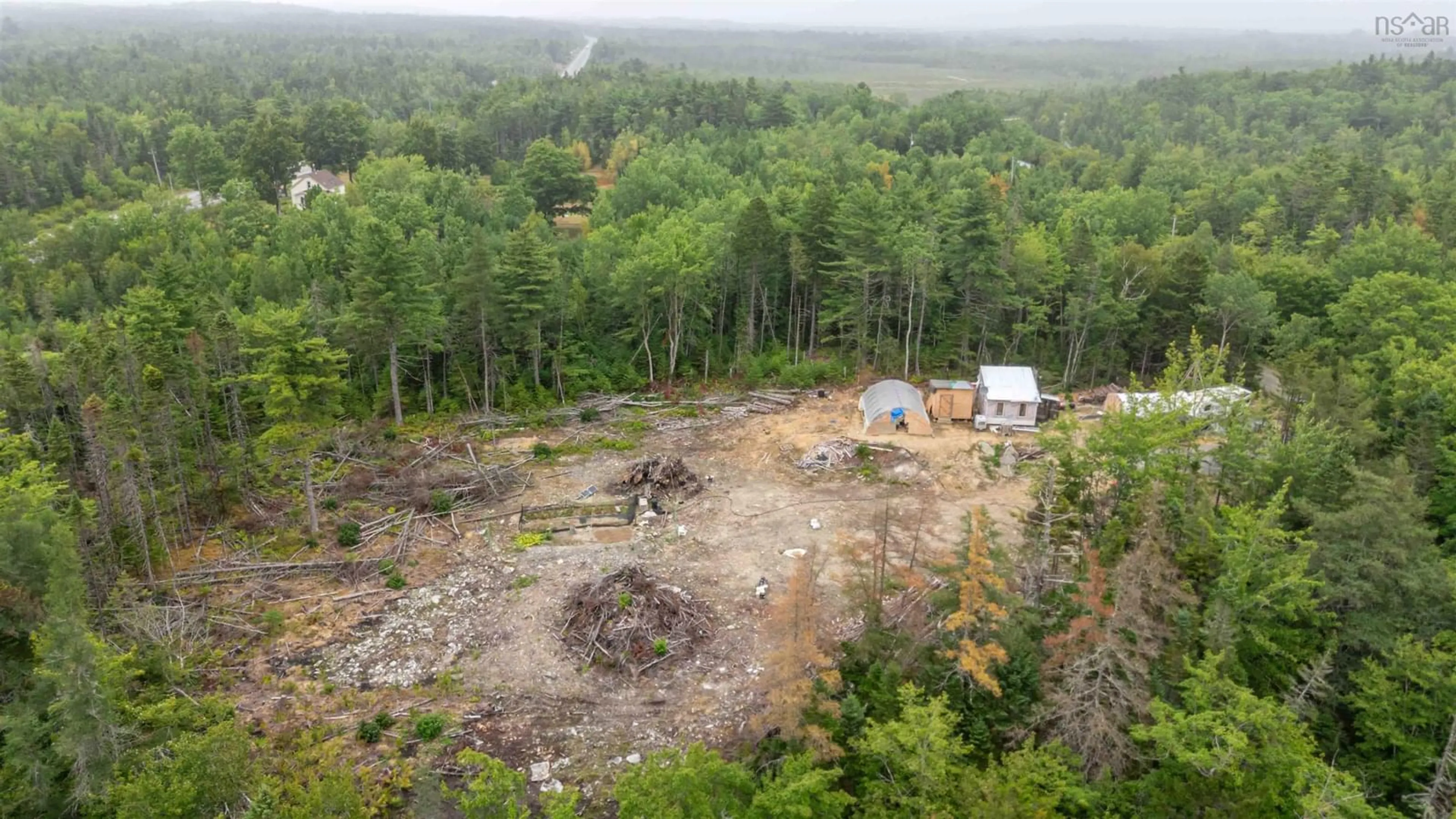 A pic from outside/outdoor area/front of a property/back of a property/a pic from drone, forest/trees view for 100 Llewellyn Loop Rd, Middlewood Nova Scotia B4V 6L4