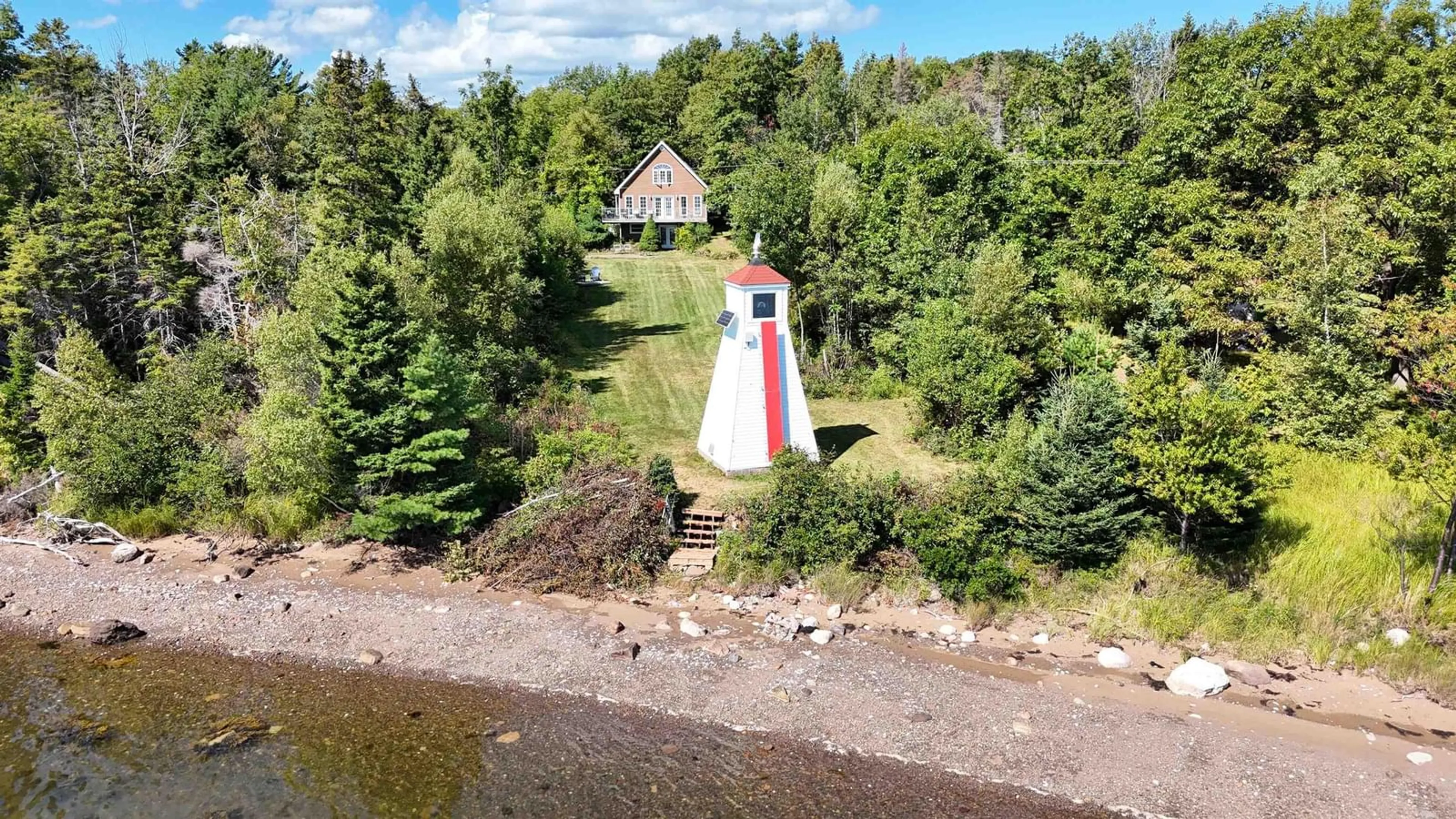 A pic from outside/outdoor area/front of a property/back of a property/a pic from drone, water/lake/river/ocean view for 77 Maclennan Lane, Bay View Nova Scotia B0K 1H0