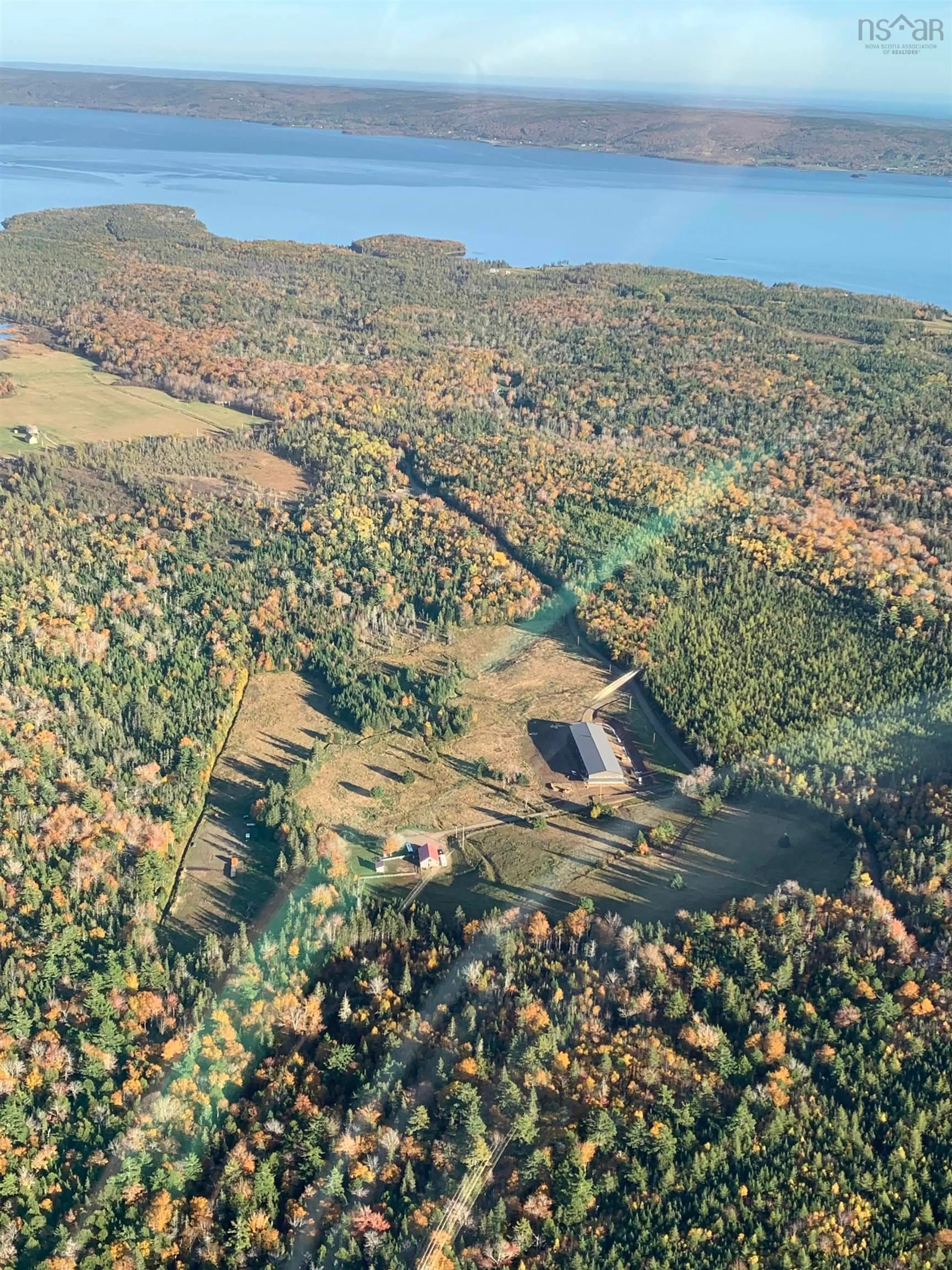 A pic from outside/outdoor area/front of a property/back of a property/a pic from drone, unknown for 220 Campbell Rd, West Bay Nova Scotia B0E 2Y0