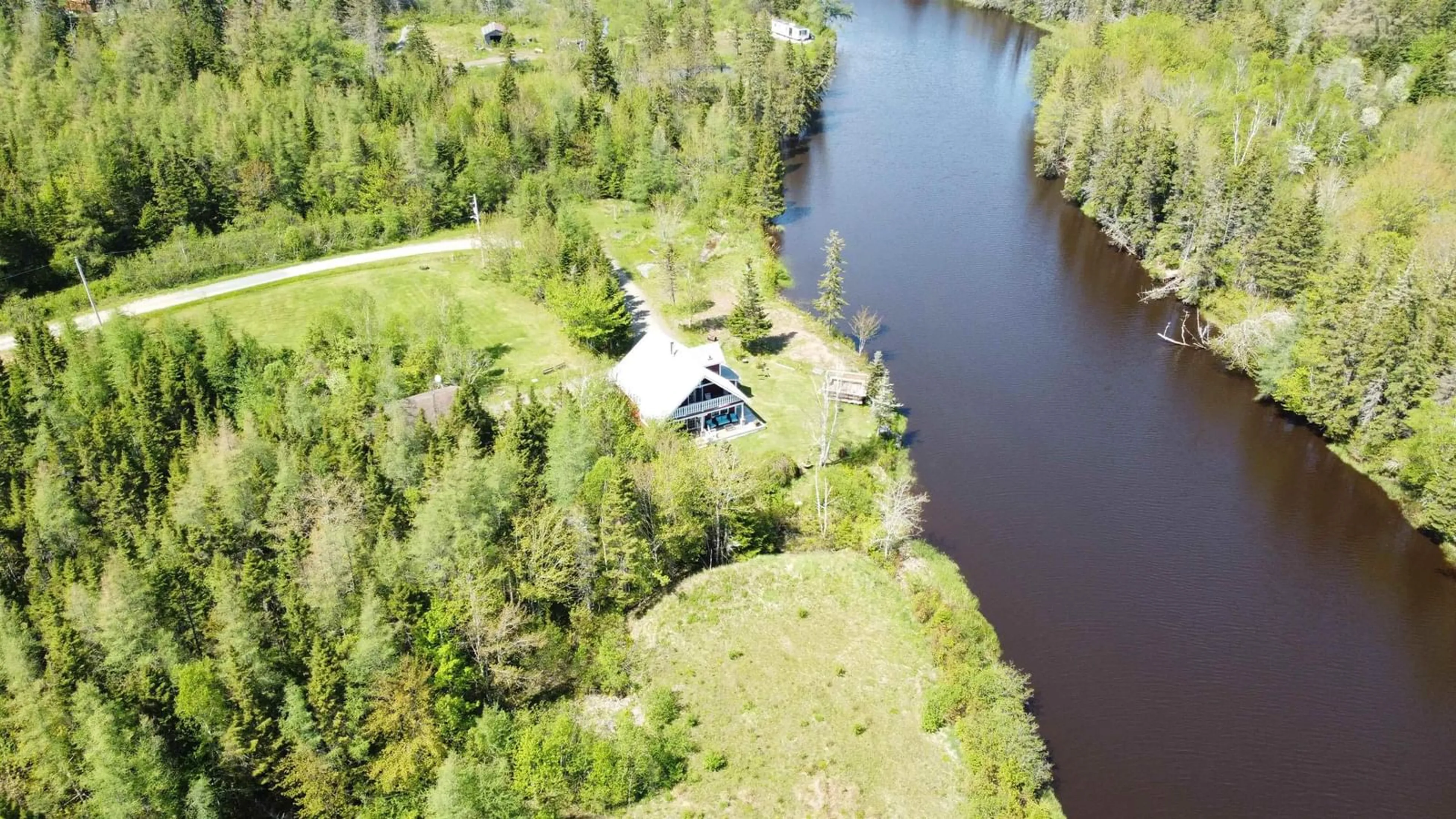 A pic from outside/outdoor area/front of a property/back of a property/a pic from drone, water/lake/river/ocean view for 77 Lower River Rd, Cleveland Nova Scotia B0E 1J0