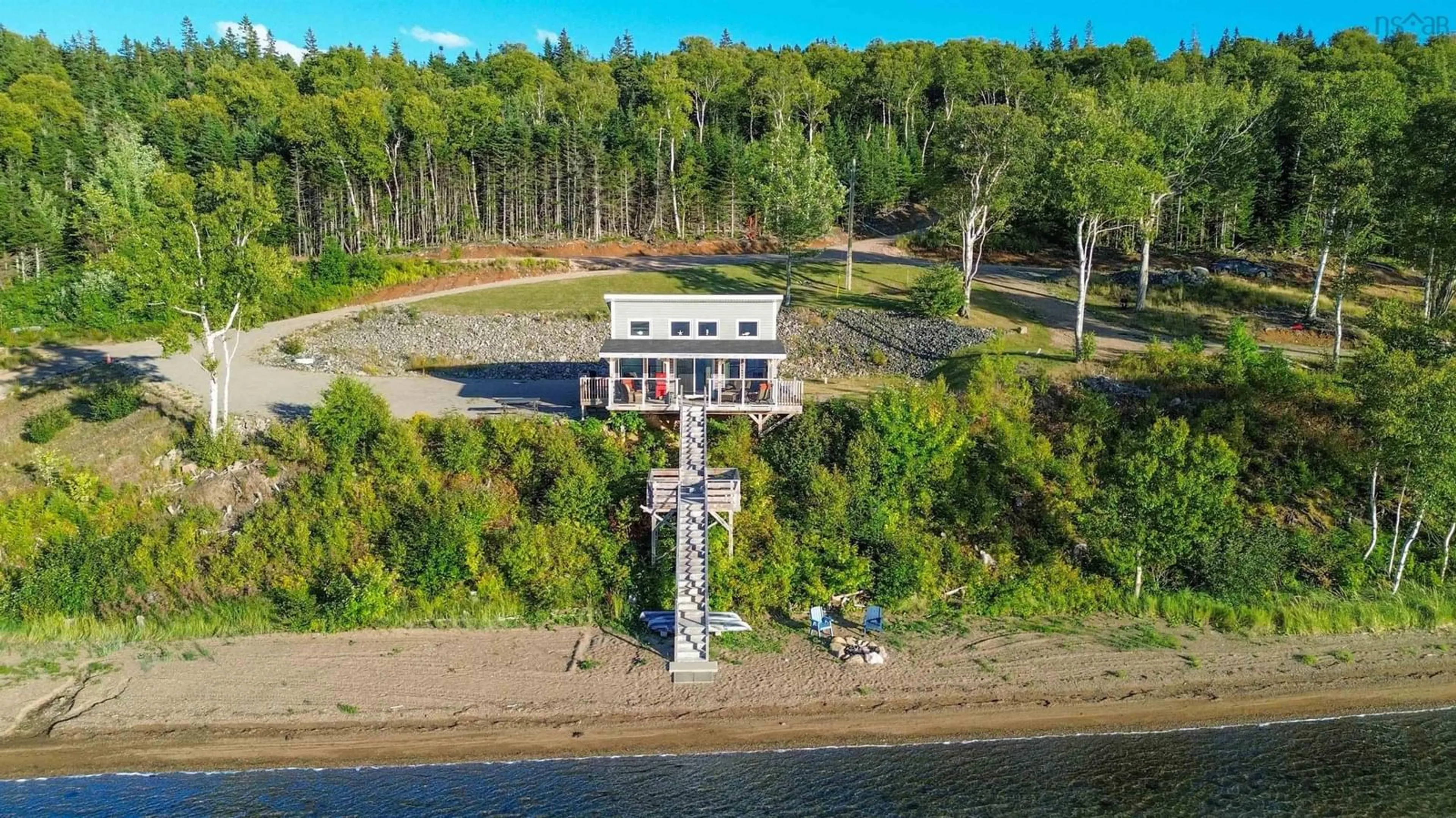 A pic from outside/outdoor area/front of a property/back of a property/a pic from drone, water/lake/river/ocean view for 10823 Kempt Head Rd, Boularderie Nova Scotia B1X 1L5