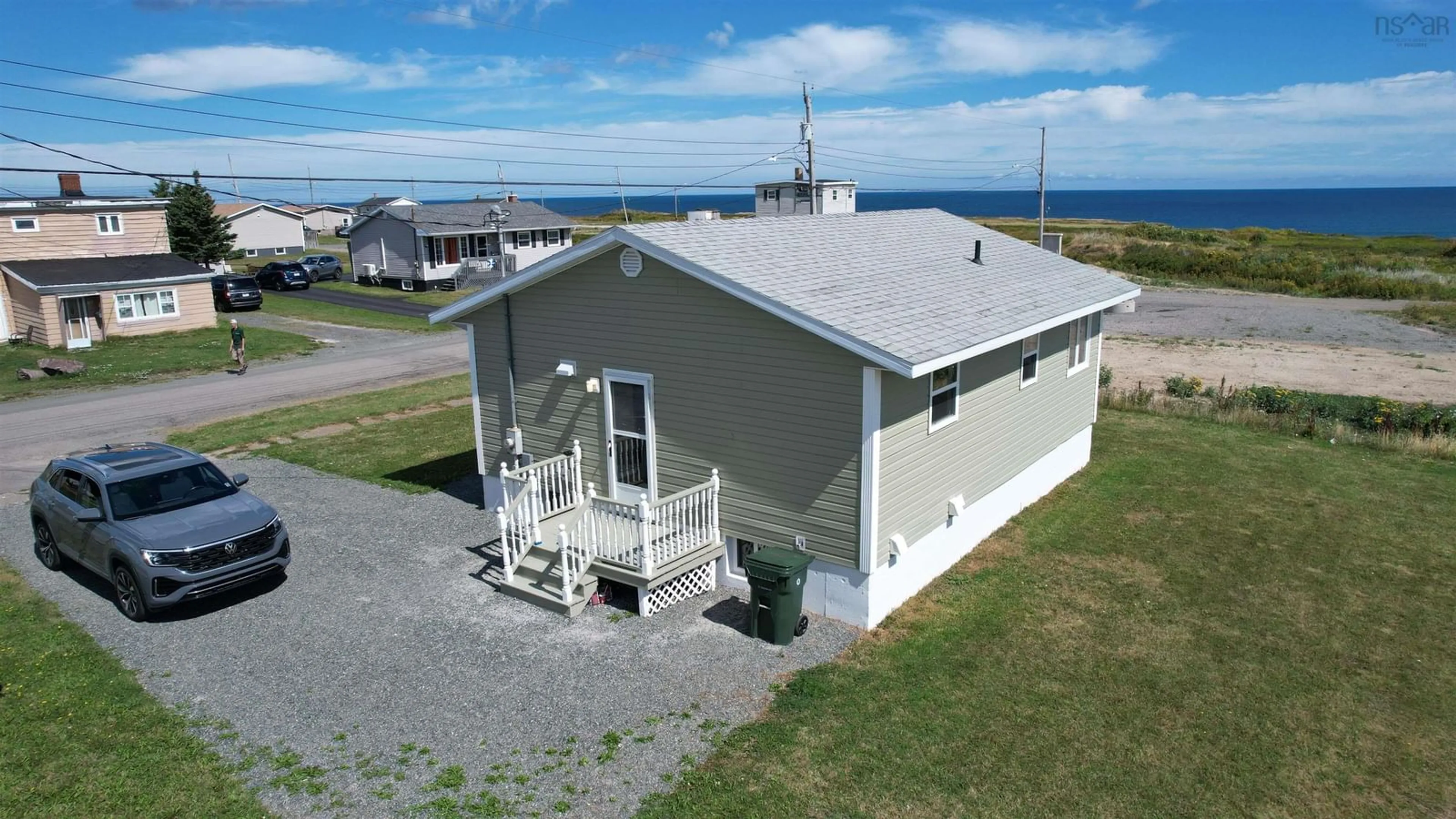 A pic from outside/outdoor area/front of a property/back of a property/a pic from drone, water/lake/river/ocean view for 96 Second Street, Glace Bay Nova Scotia B1A 4E4