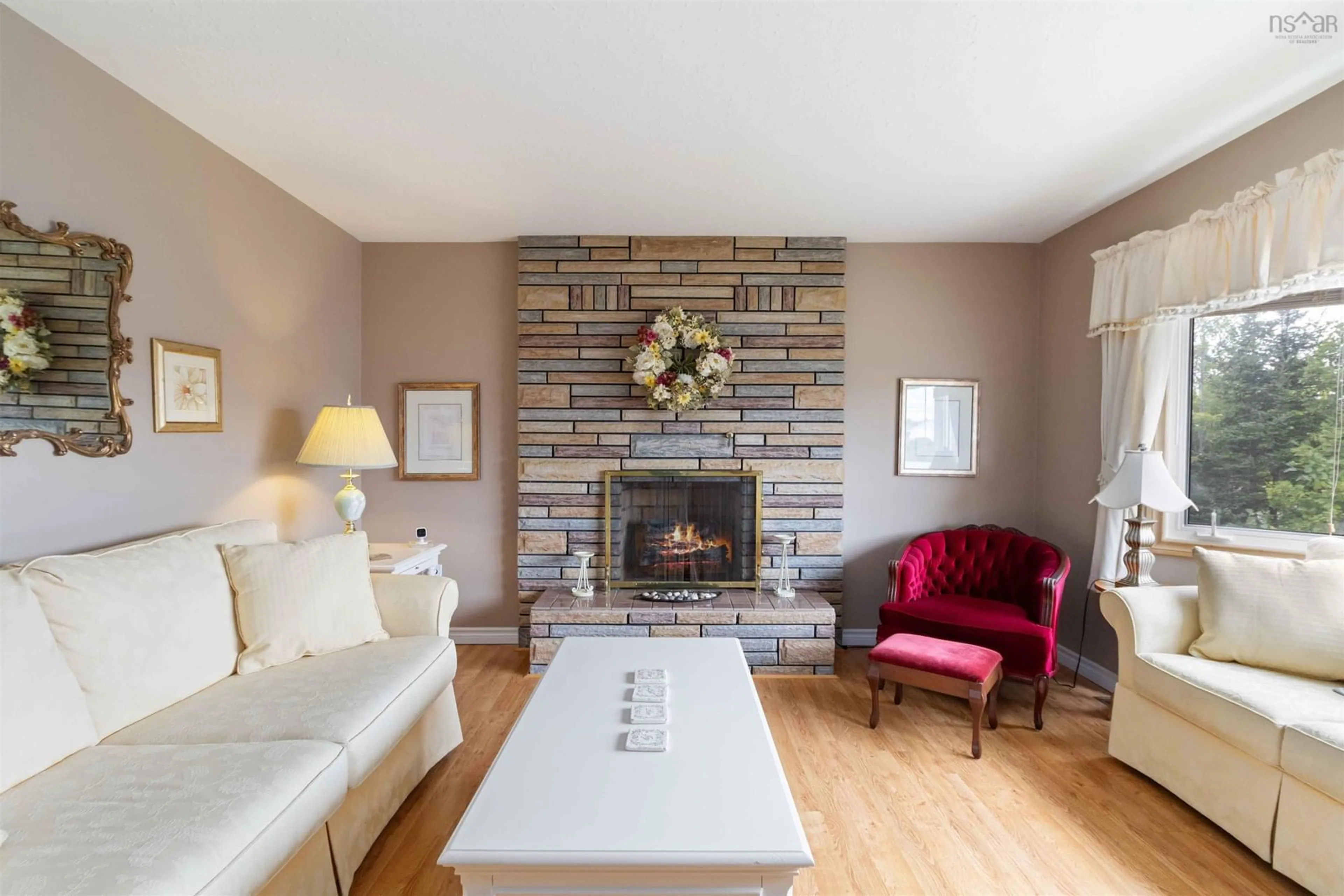 Living room with furniture, wood/laminate floor for 4 Aubrey Terr, Eastern Passage Nova Scotia B3G 1C6