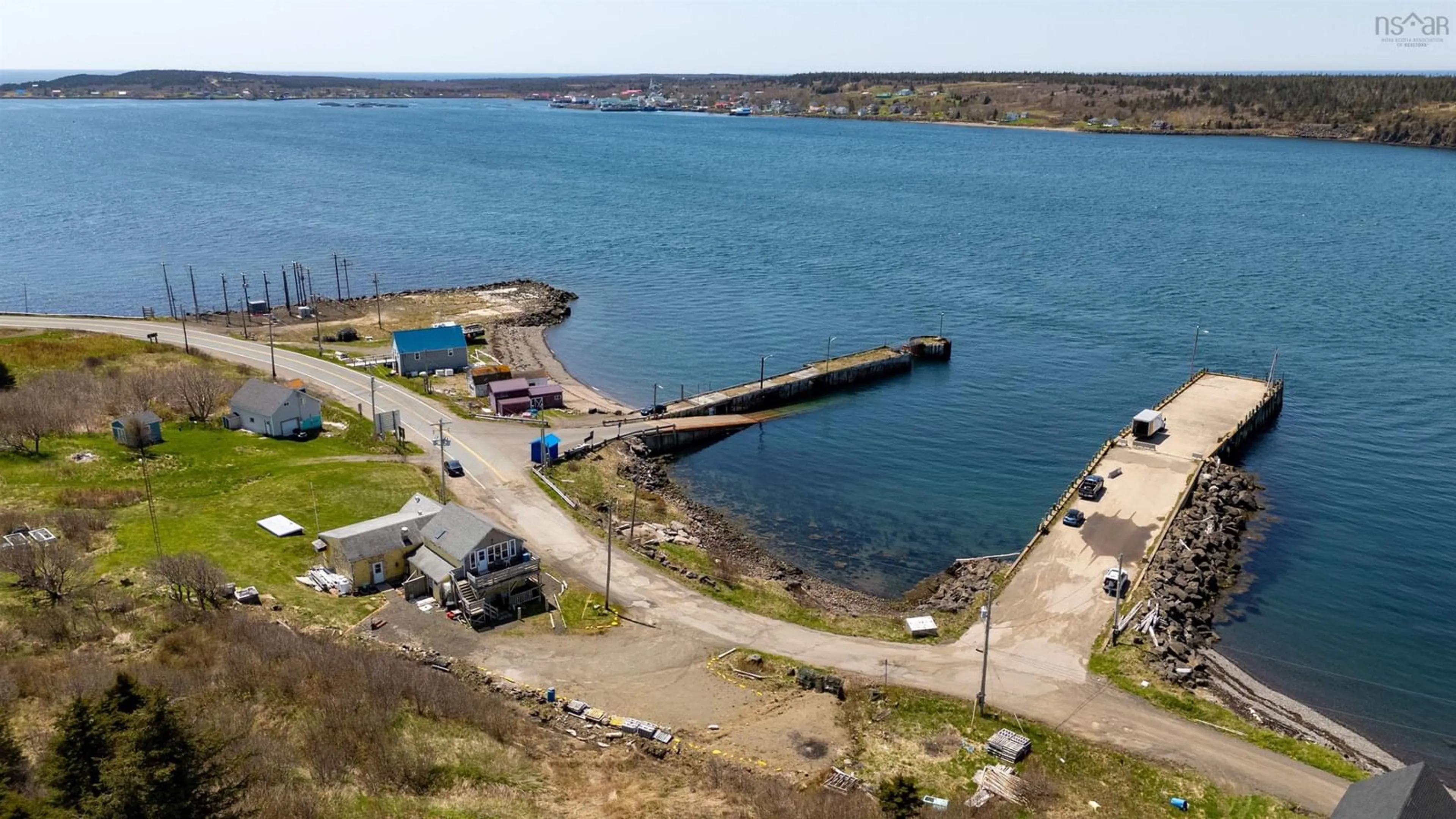 A pic from outside/outdoor area/front of a property/back of a property/a pic from drone, water/lake/river/ocean view for 15 Highway 217, Freeport Nova Scotia B0V 1B0