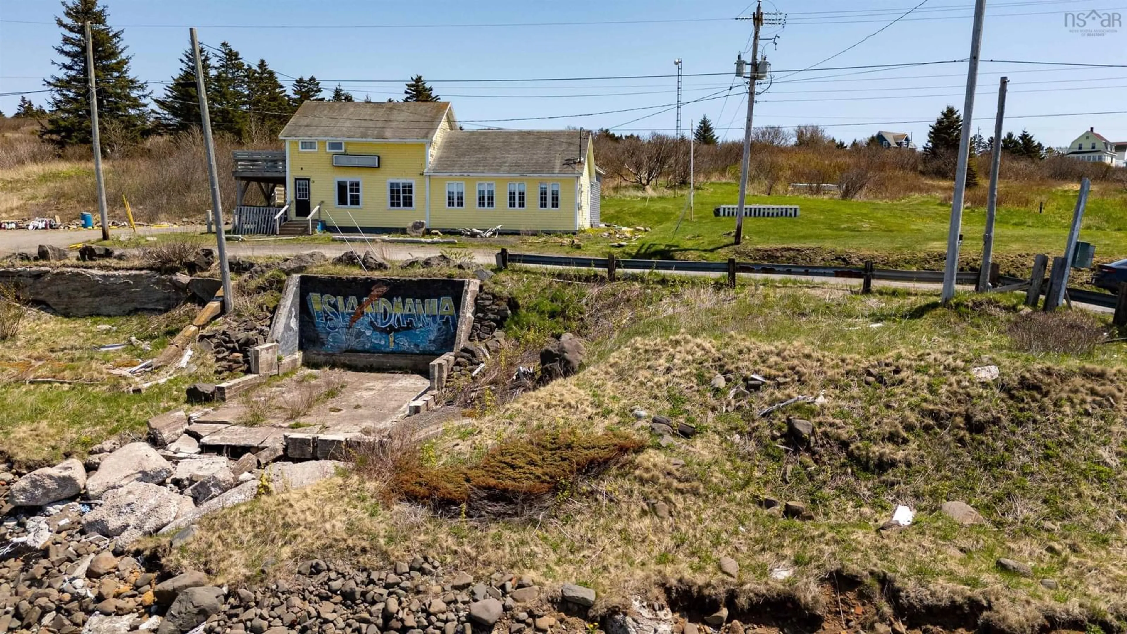 A pic from outside/outdoor area/front of a property/back of a property/a pic from drone, unknown for 15 Highway 217, Freeport Nova Scotia B0V 1B0