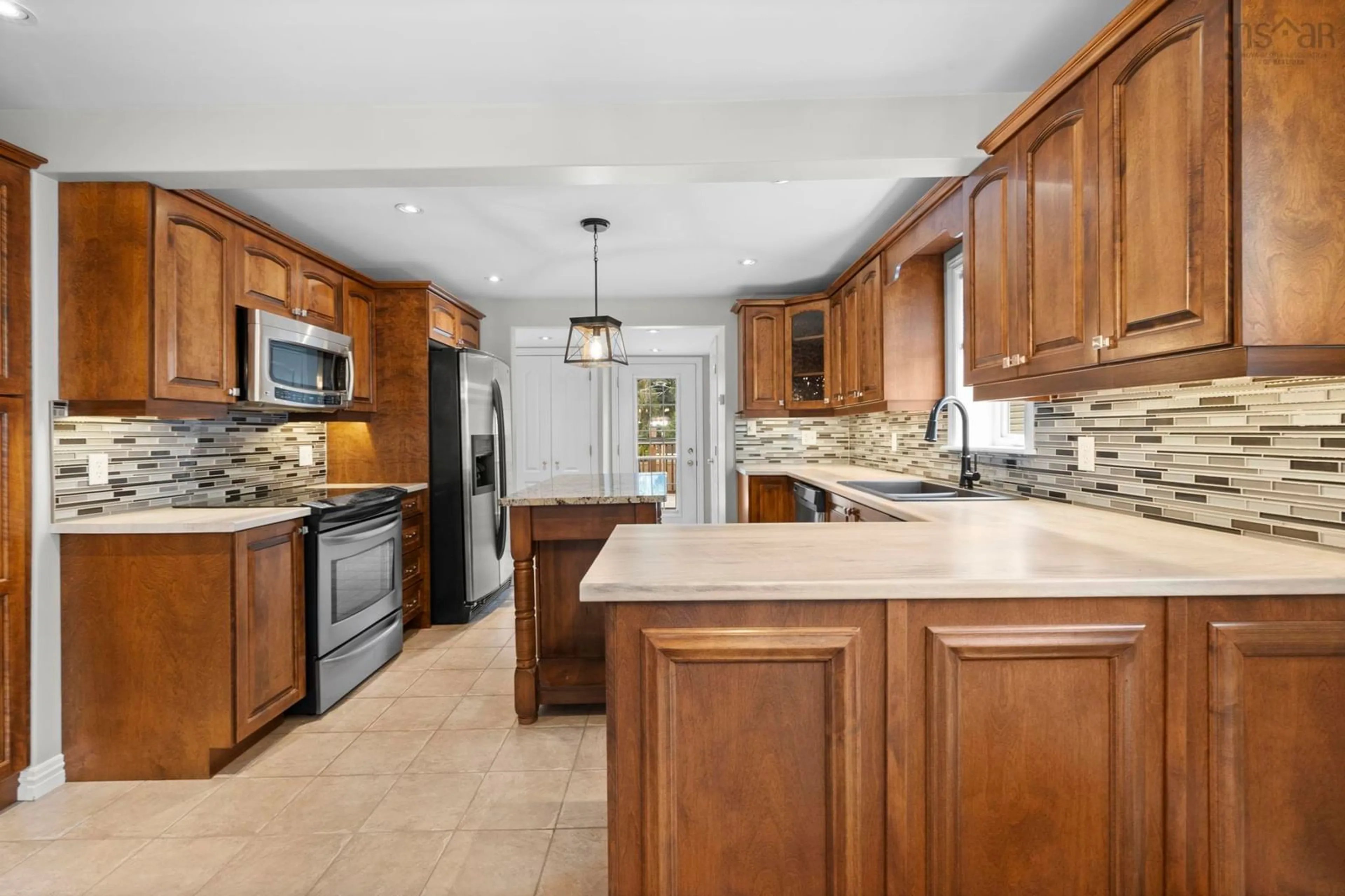 Open concept kitchen, ceramic/tile floor for 2828 Connolly St, Halifax Nova Scotia B3L 3N4