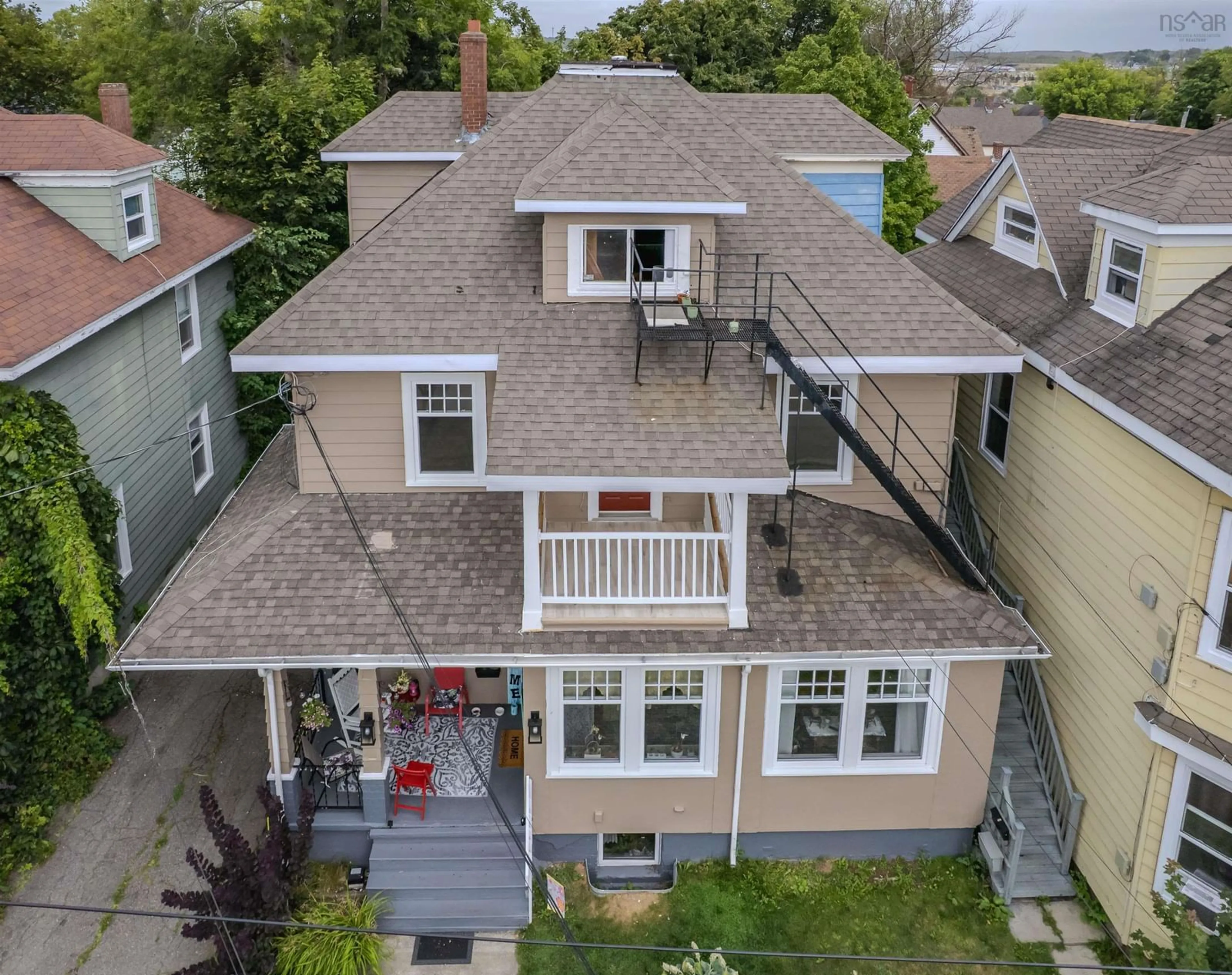 A pic from outside/outdoor area/front of a property/back of a property/a pic from drone, street for 41 Charlotte, Sydney Nova Scotia B1P 1B5